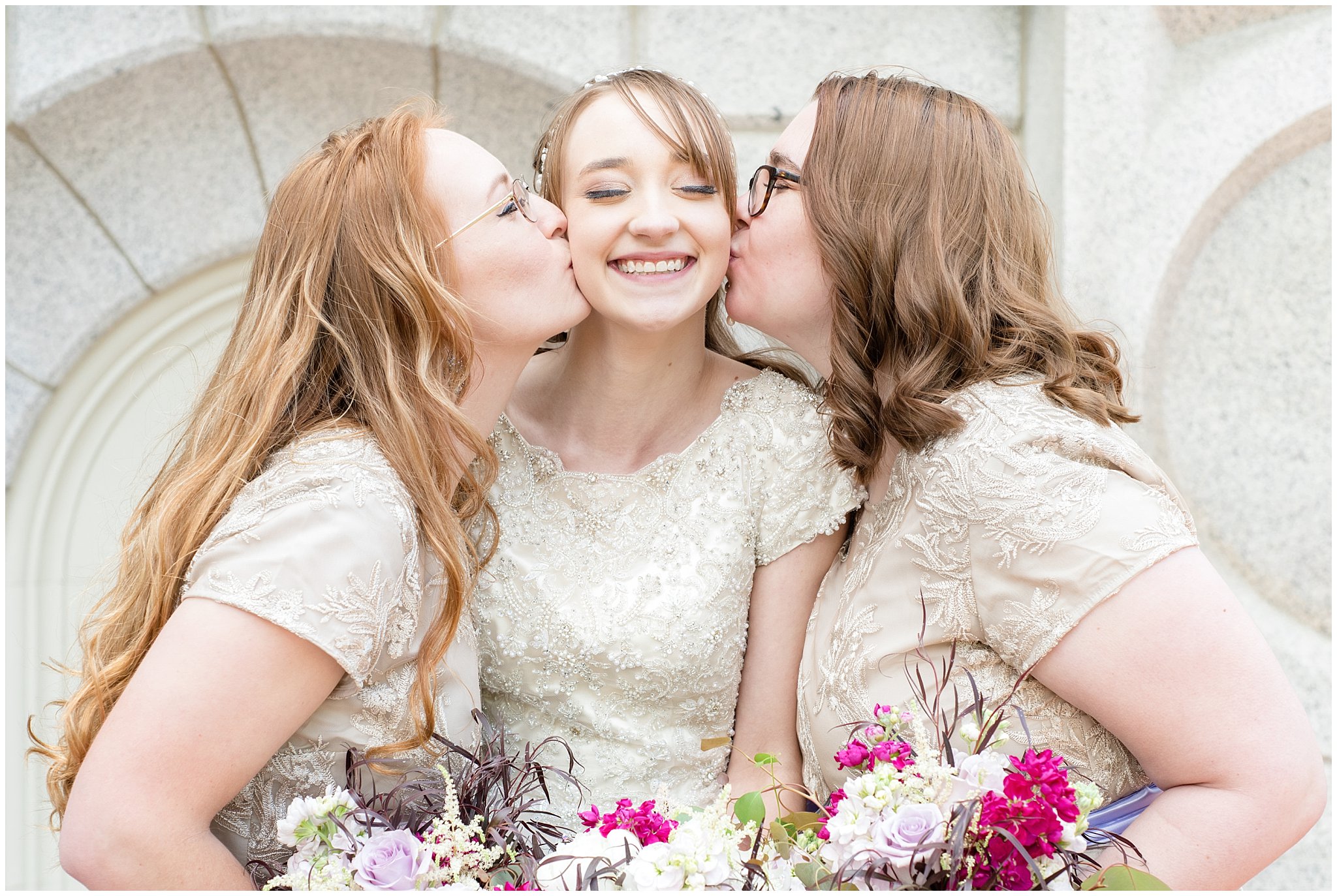 Bride with bridesmaids kissing her on the cheek | Candid wedding pictures | Salt Lake Temple Wedding | Jessie and Dallin Photography