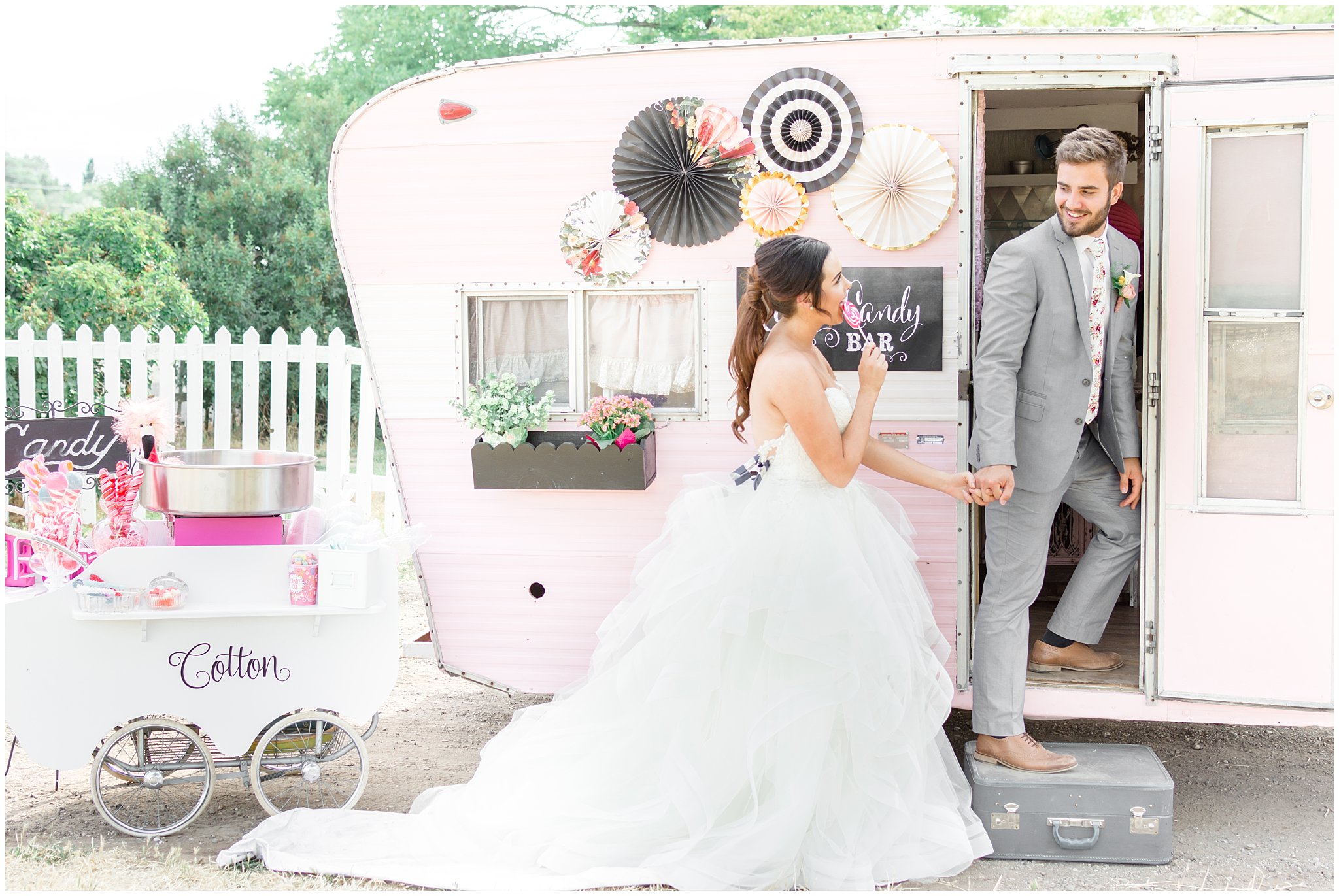 Bride and groom in front of airbnb style trailer | This is the Place Heritage Park | Green and Pink Garden Wedding | Jessie and Dallin Photography