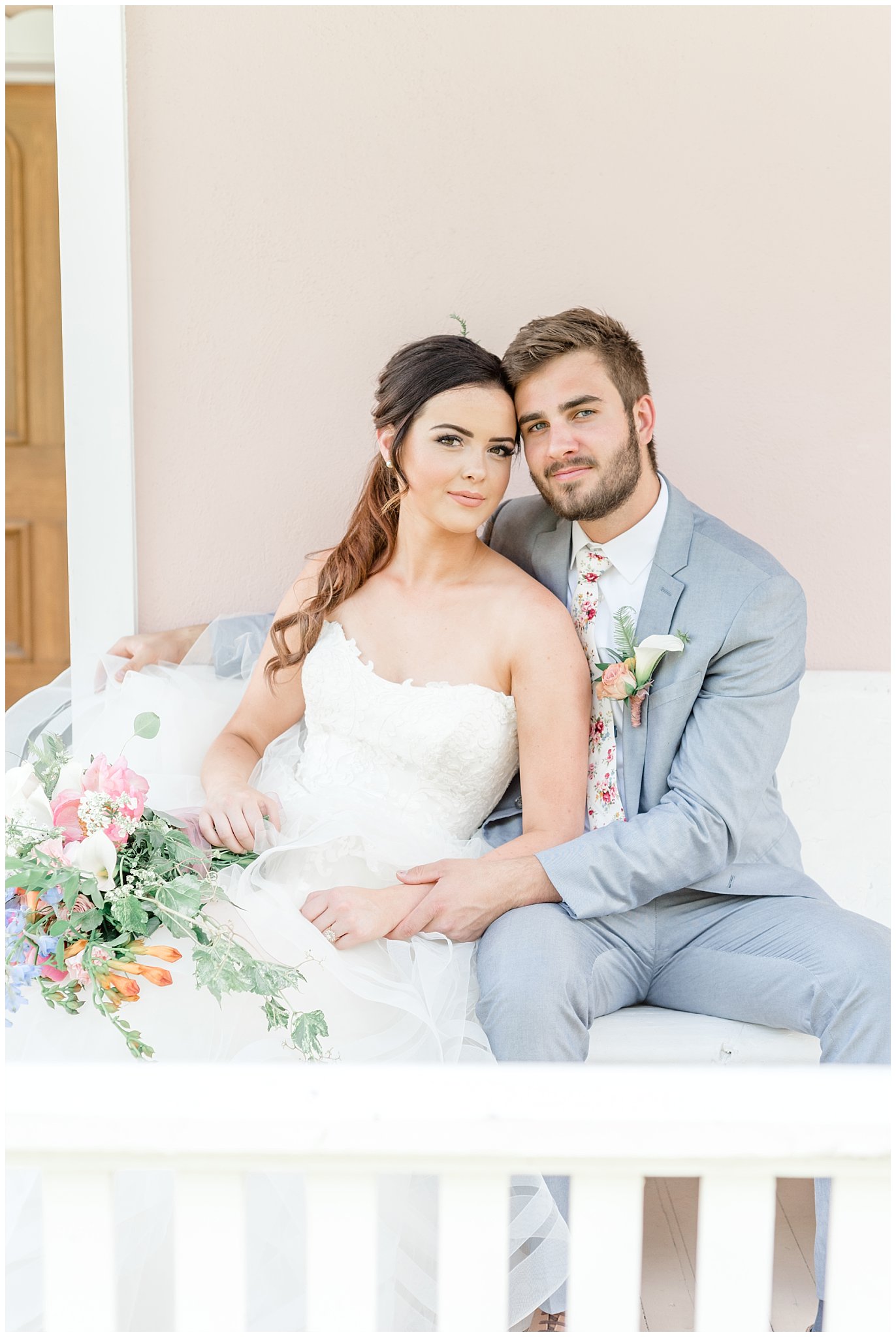 Elegant bride and groom on porch bench | This is the Place Heritage Park | Green and Pink Garden Wedding | Jessie and Dallin Photography