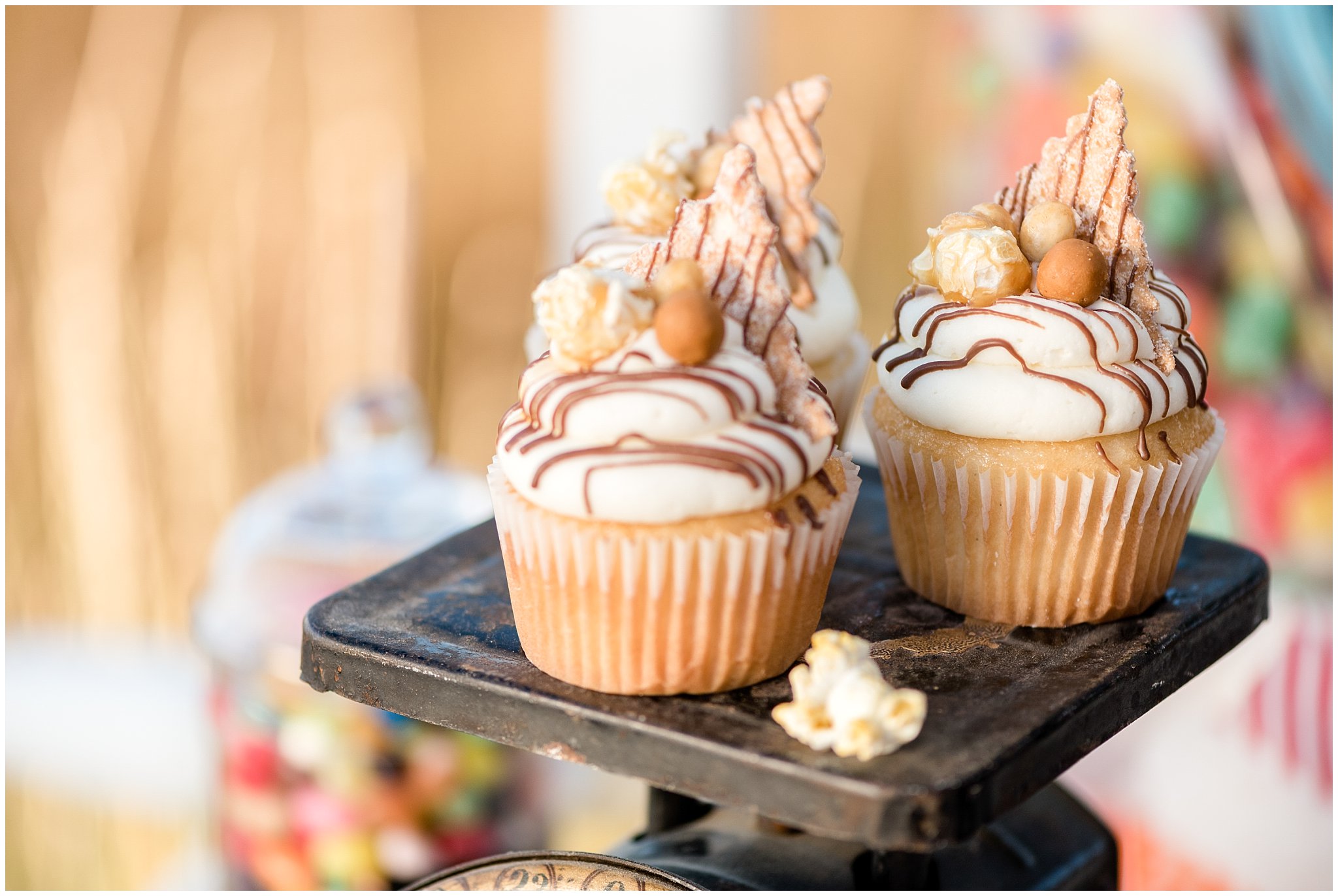 Closeup picture of details of caramel cupcakes on a vintage scale for a wedding in Utah | Jessie and Dallin Photography | Utah Wedding Photographers