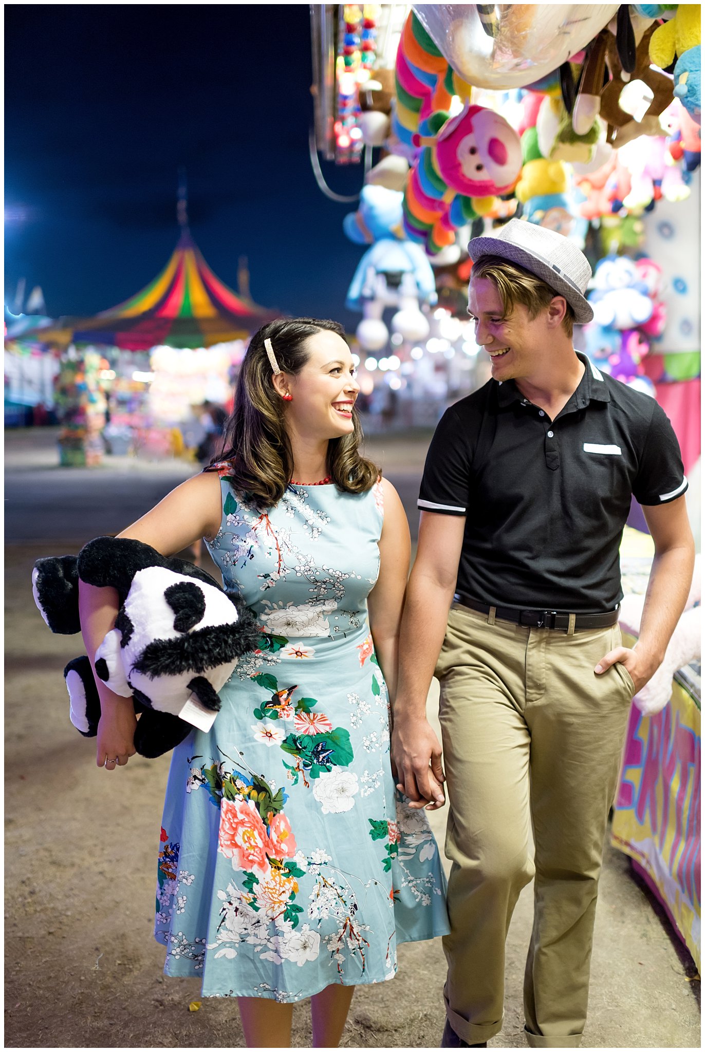 Couple plays carnival games at the state fair during their engagement session in Utah | Jessie and Dallin Photography | Utah Wedding Photographers