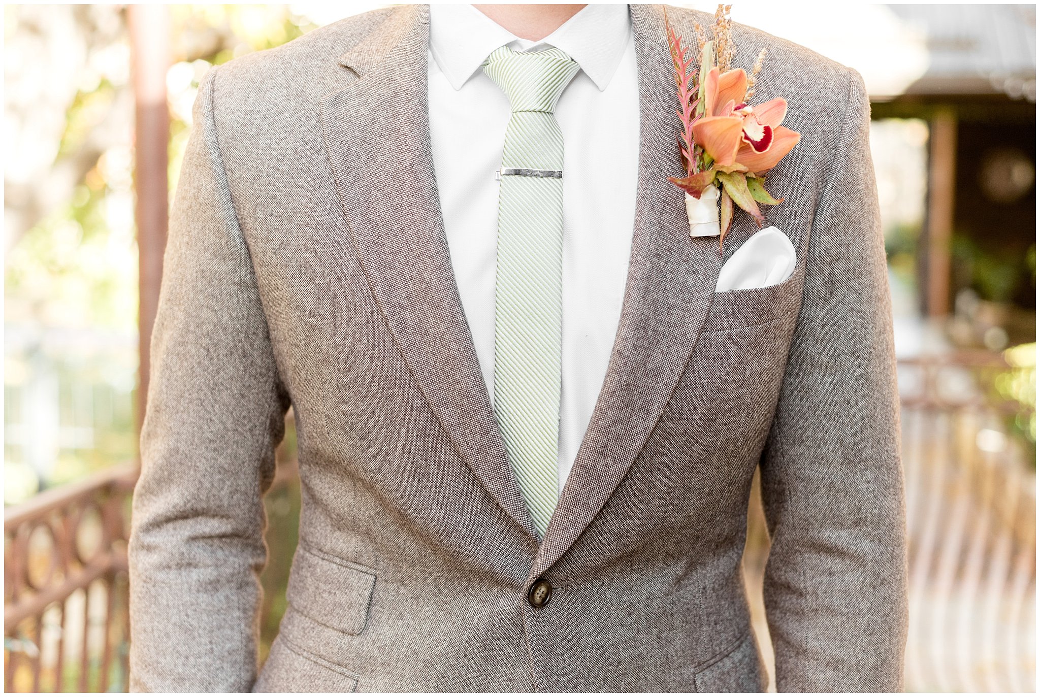 Groom in custom fit light brown suit and mint green tie | Wadley Farms Elegant Utah Wedding | Jessie and Dallin Photography