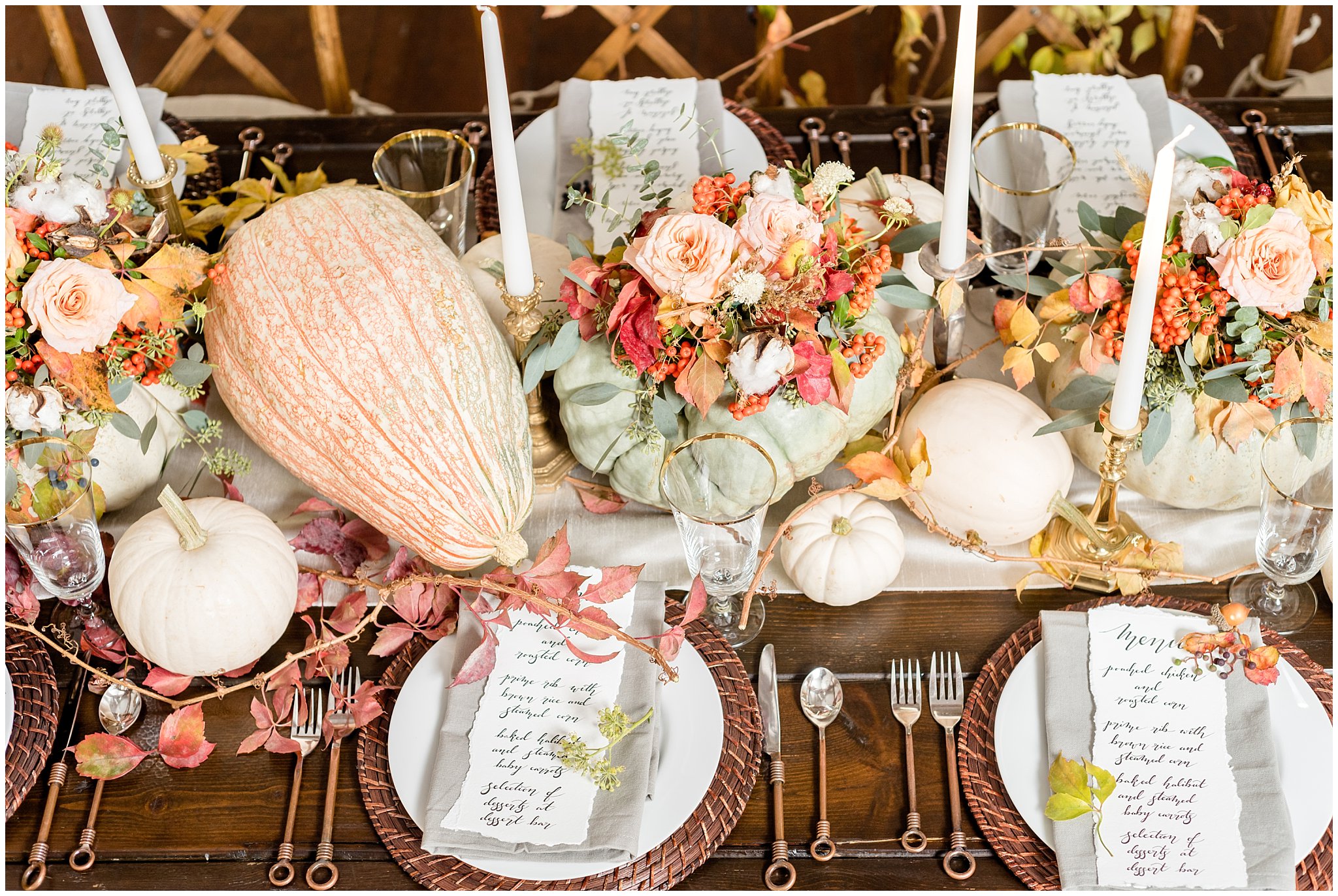 Fall pumpkin and squash, and menu on farmhouse table | elegant wedding setup and table setting ideas | Wadley Farms Elegant Fall Utah Wedding | Jessie and Dallin Photography