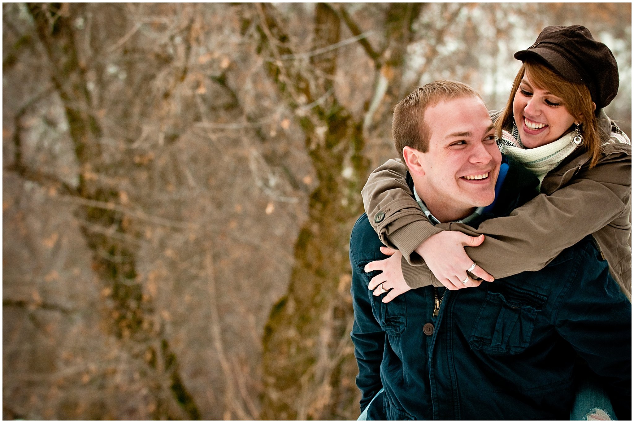 Winter engagement photos, couple with coats, scarves, hat