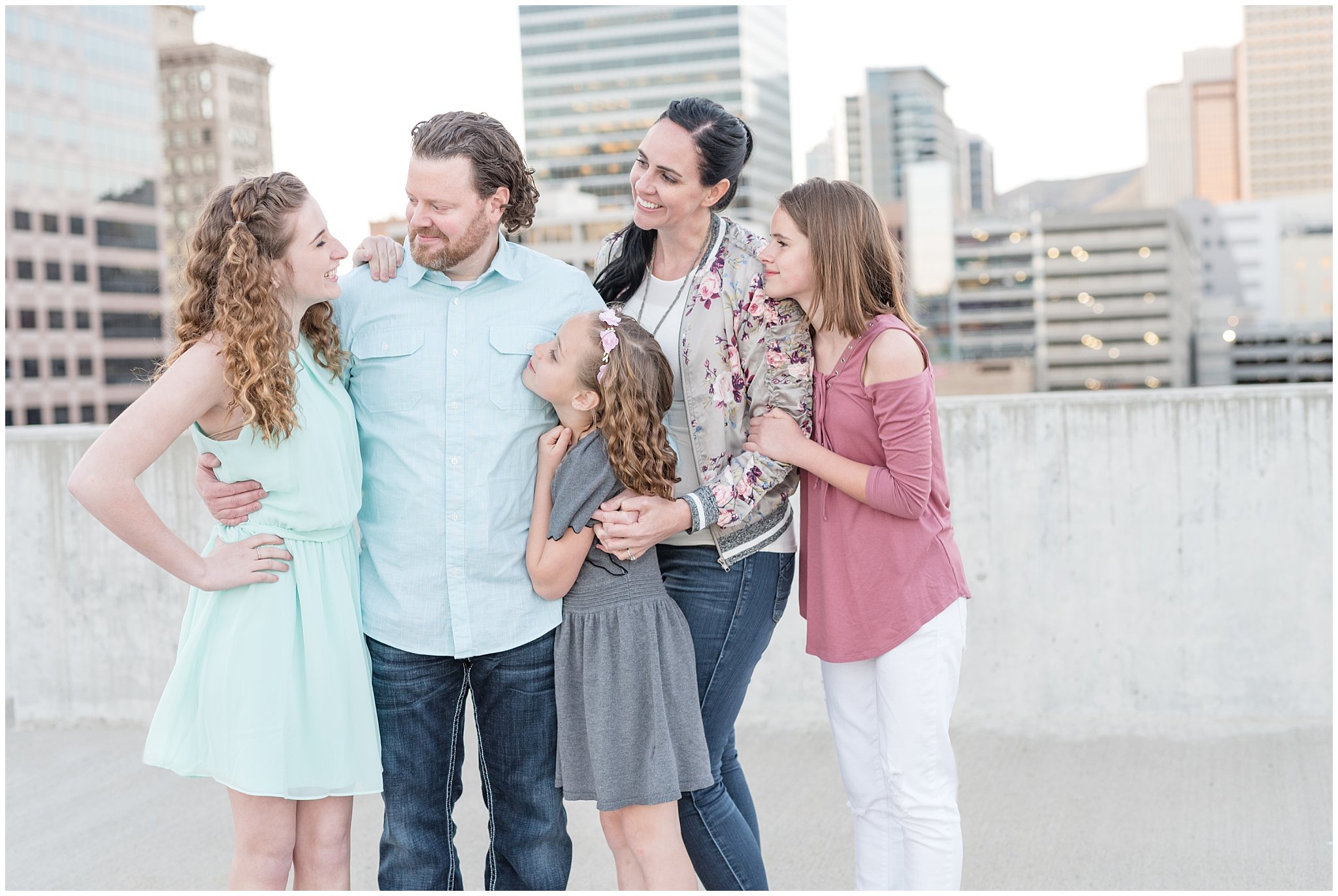 Downtown Salt Lake urban family session | Family standing on rooftop