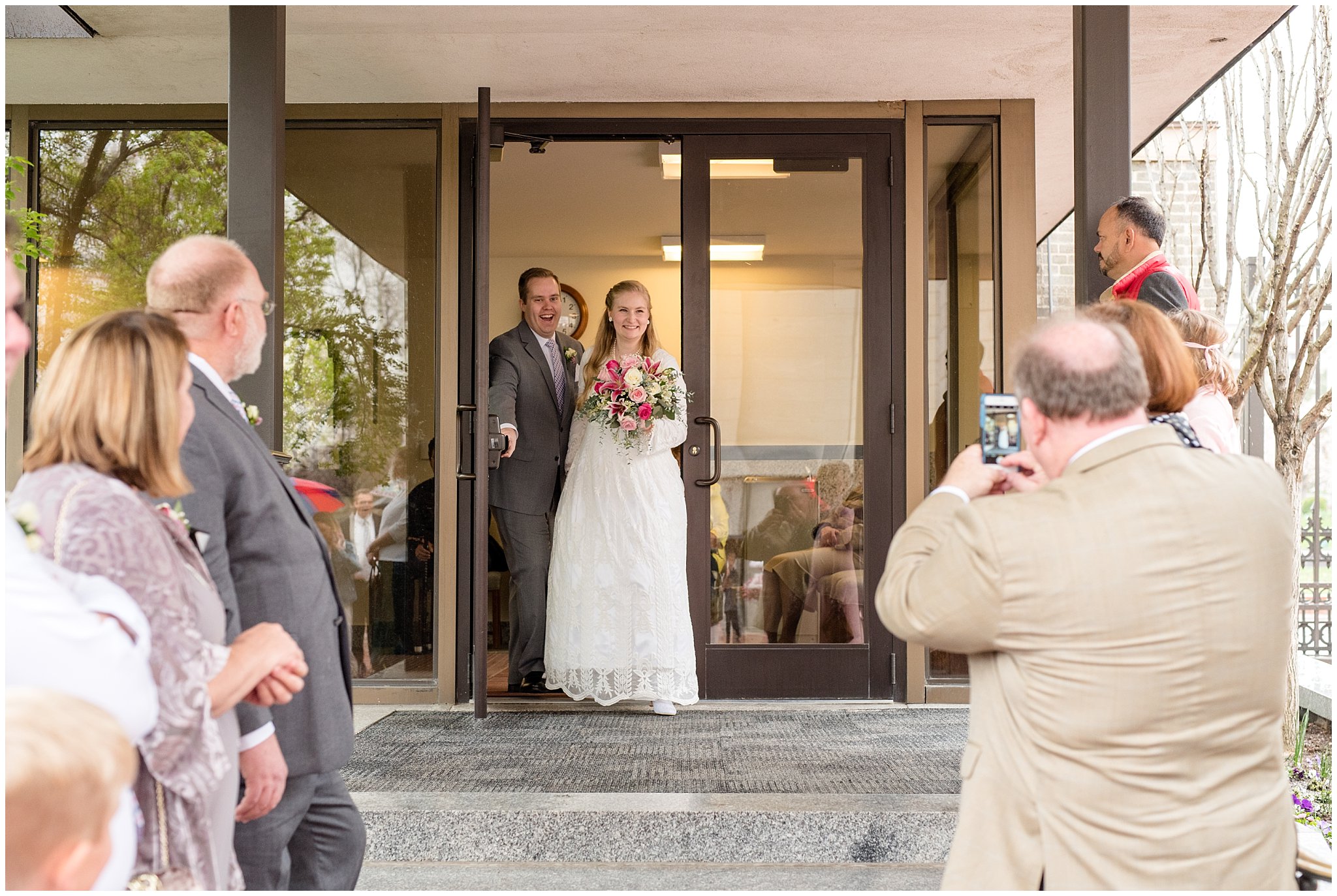 Salt Lake Temple spring wedding | bride and groom exit | Rose, raspberry, and navy wedding
