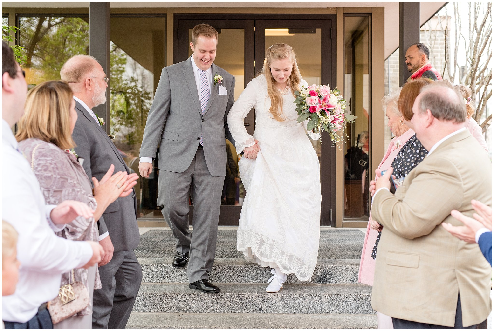 Salt Lake Temple spring wedding | bride and groom exit | Rose, raspberry, and navy wedding