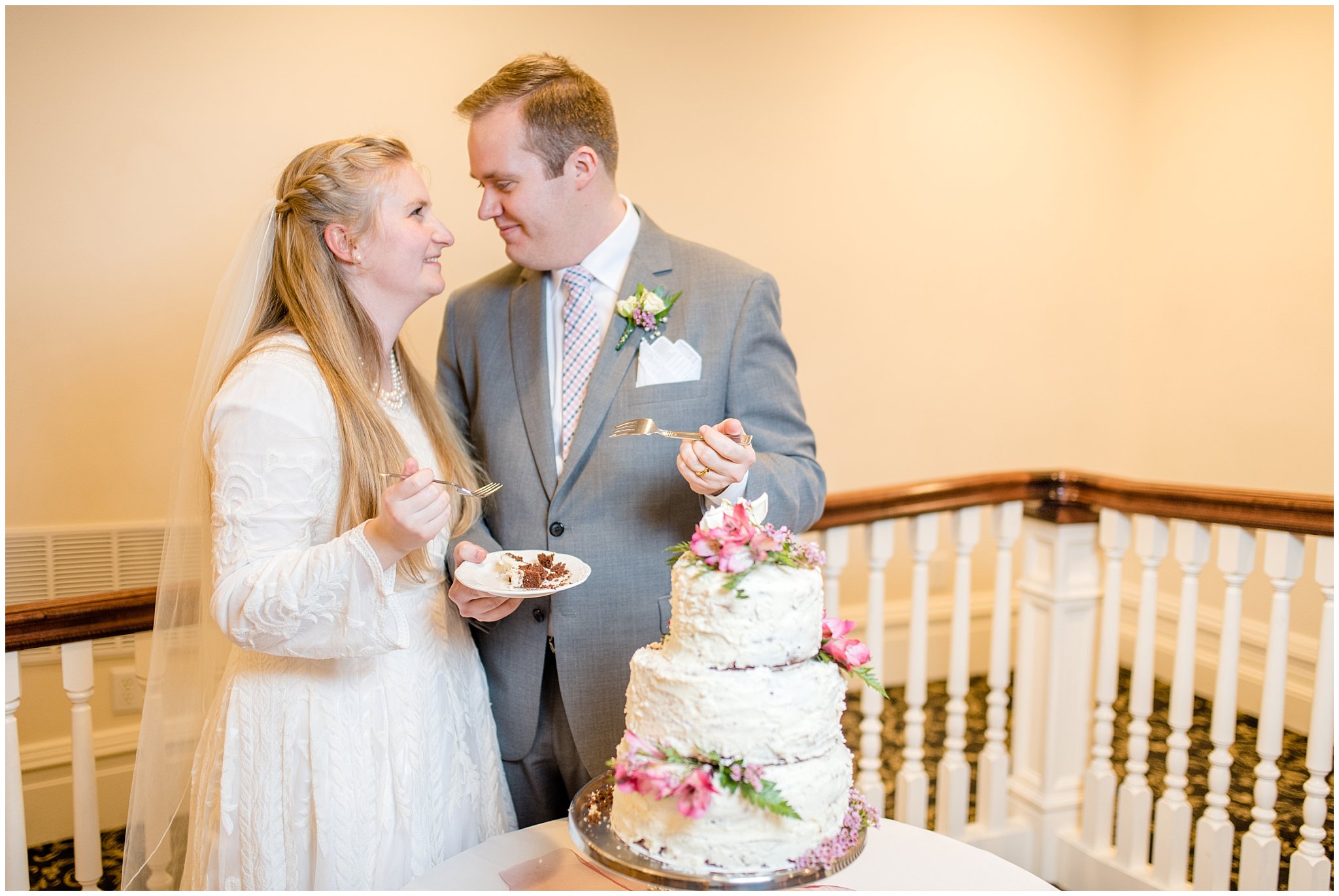 cake cutting reception pictures | rose, raspeberry, and navy wedding | Eldredge Manor