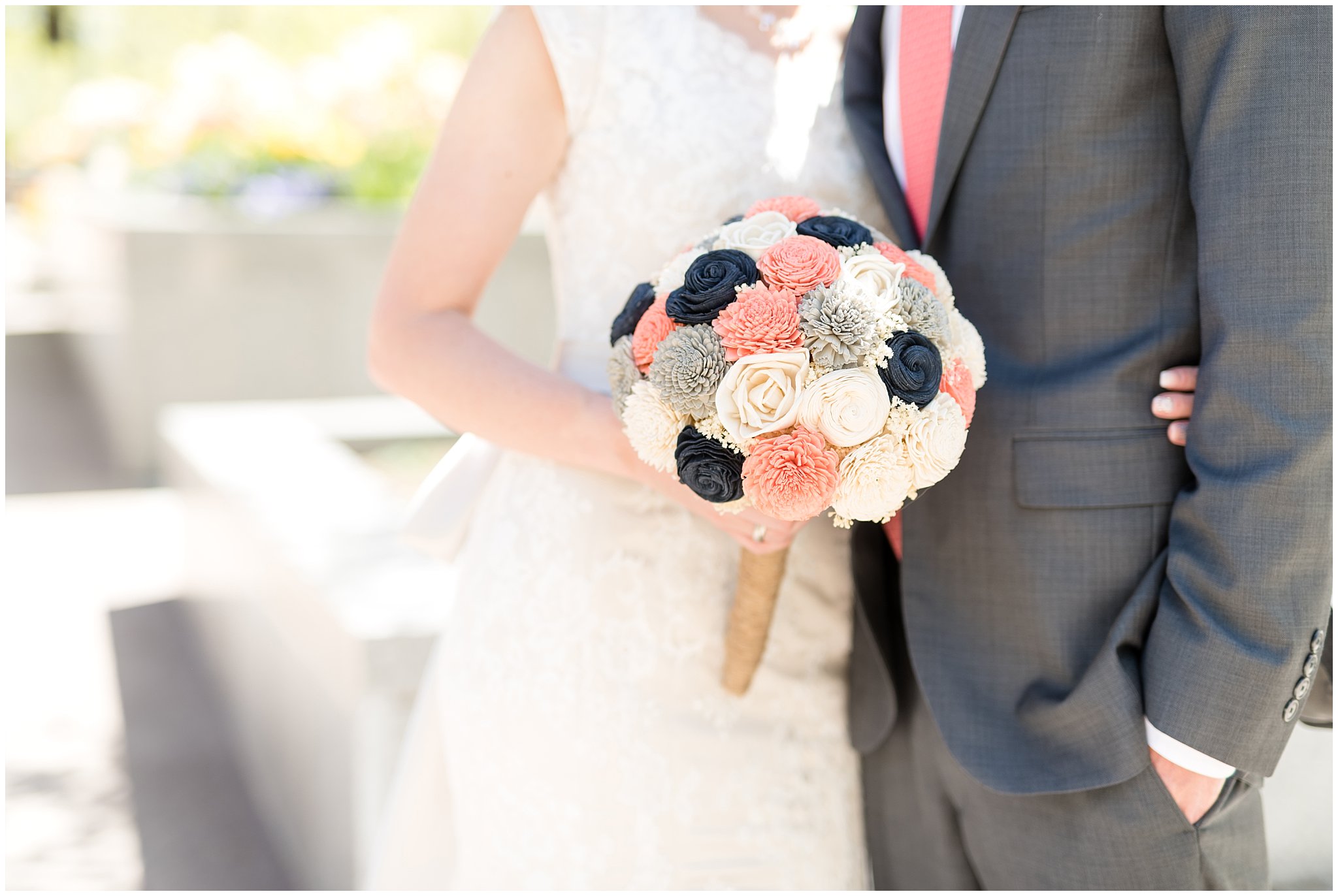 Salt Lake Temple spring wedding | Coral and grey wedding | Bride and groom pictures at the temple | wooden bouquet