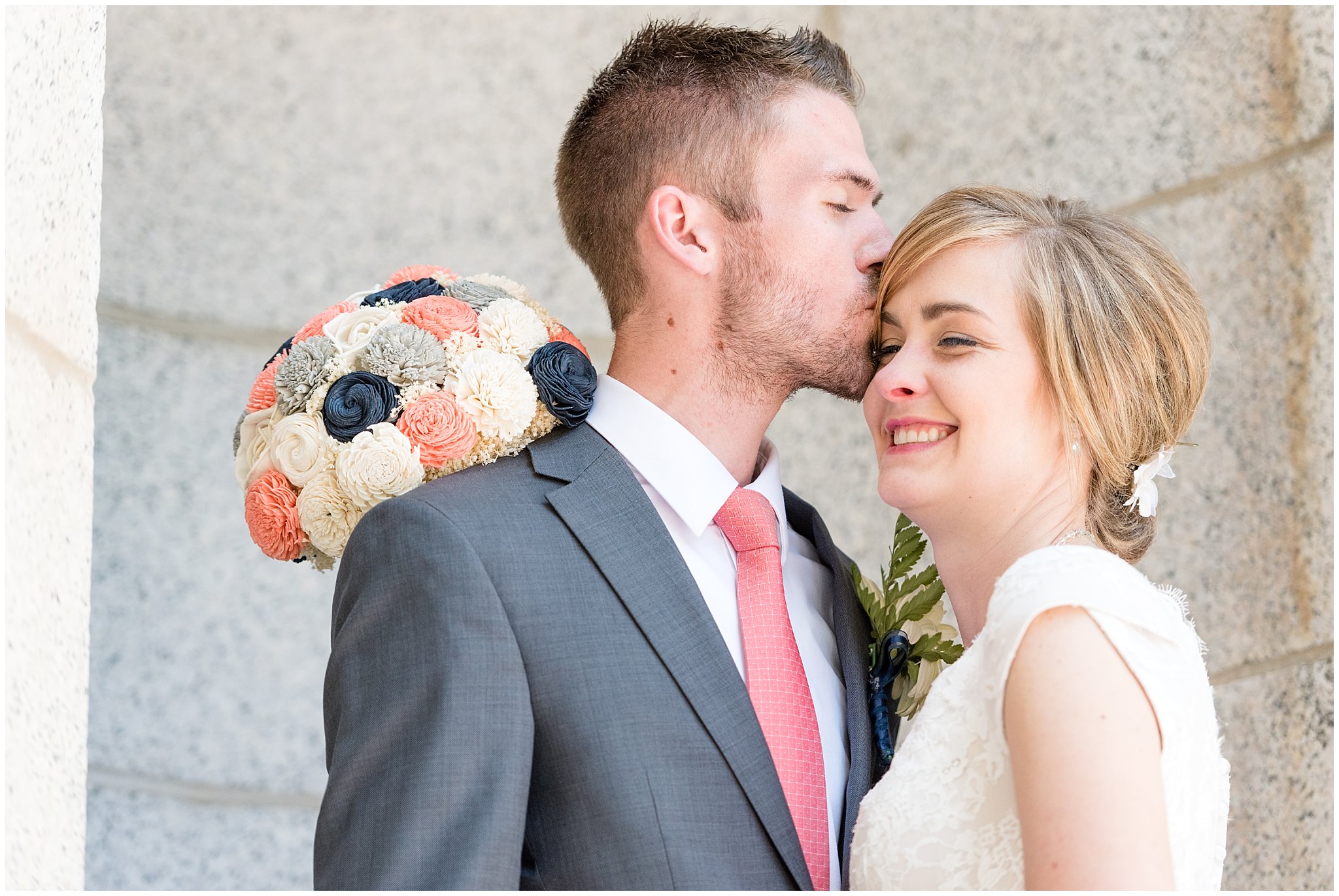 Salt Lake Temple spring wedding | Coral and grey wedding | Bride and groom pictures in the alcove