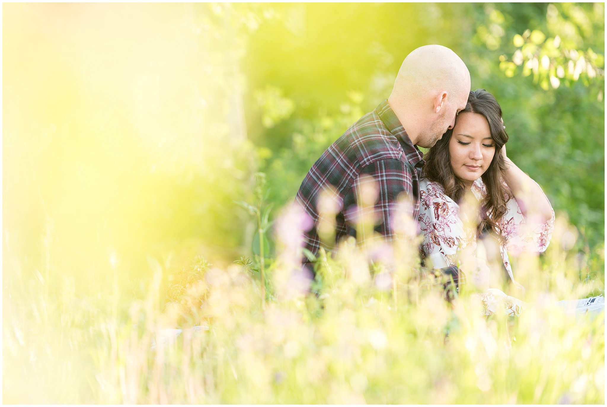 Couple in the Aspen Trees and wildflowers during engagement session | Snowbasin Utah Engagements