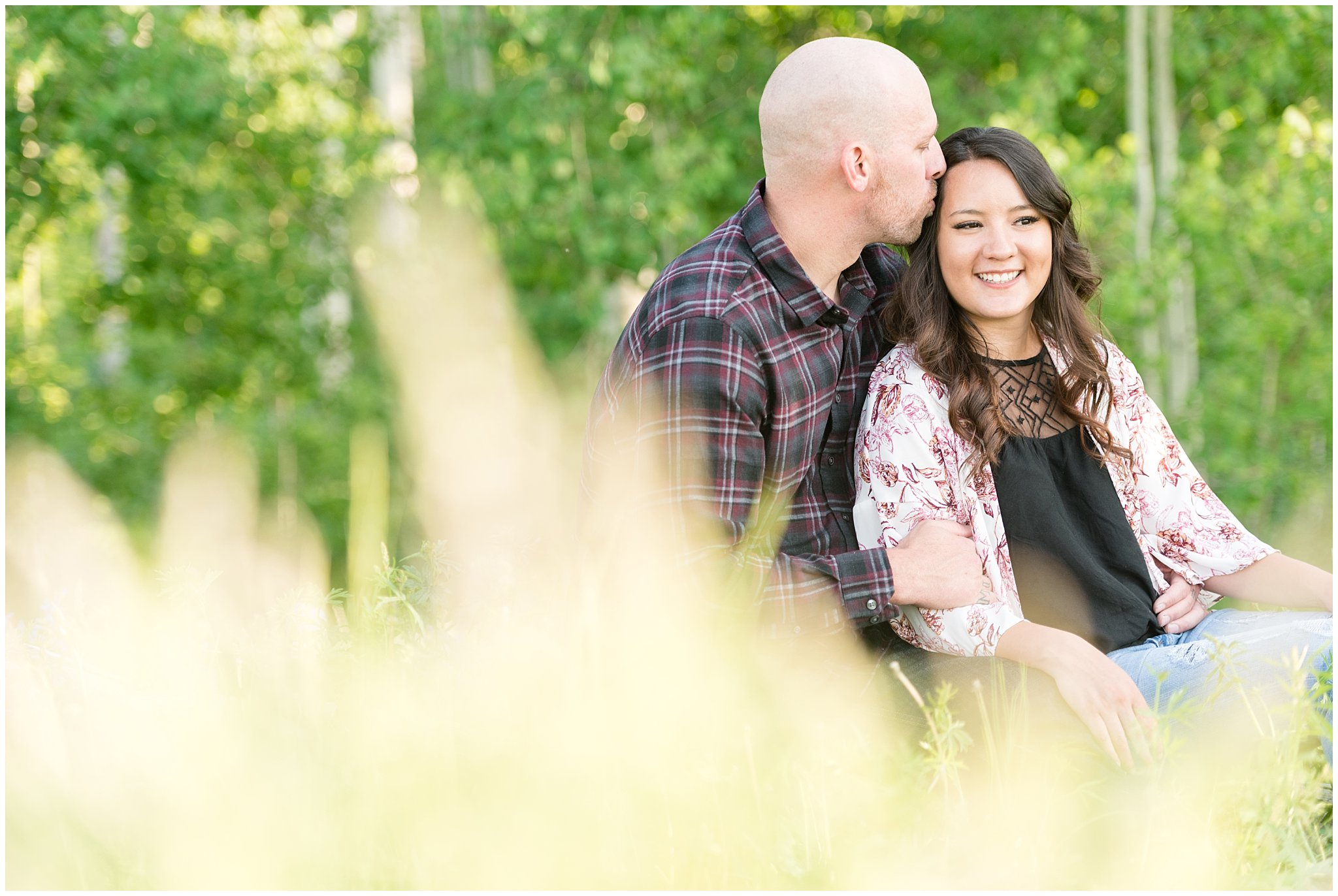 Candid couple pictures in the Aspen Trees and wildflowers during engagement session | Snowbasin Utah Engagements