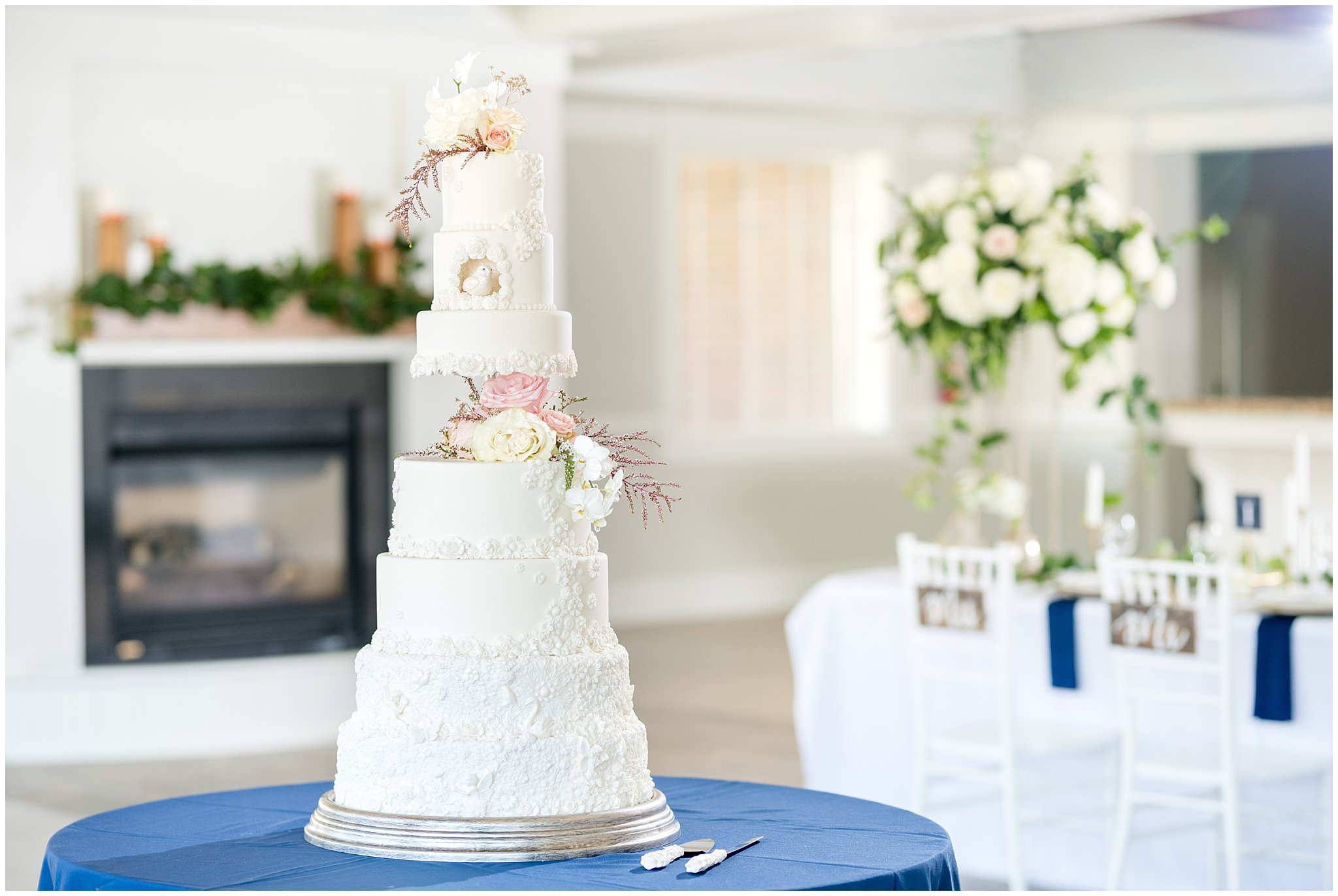 Eight tier white elegant wedding cake | gold, navy and white wedding | Talia Event Center