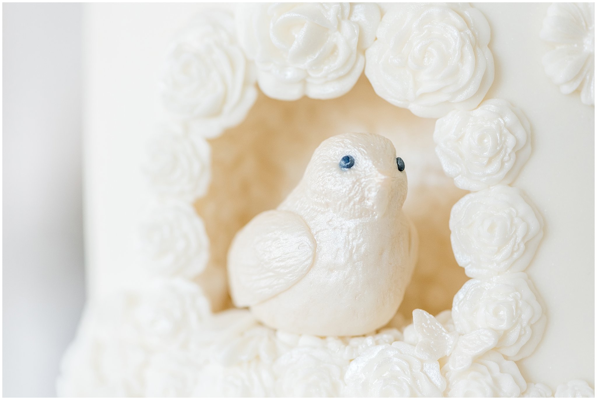 Elegant white wedding cake detail | Bird in a nest | gold, navy and white wedding | Talia Event Center