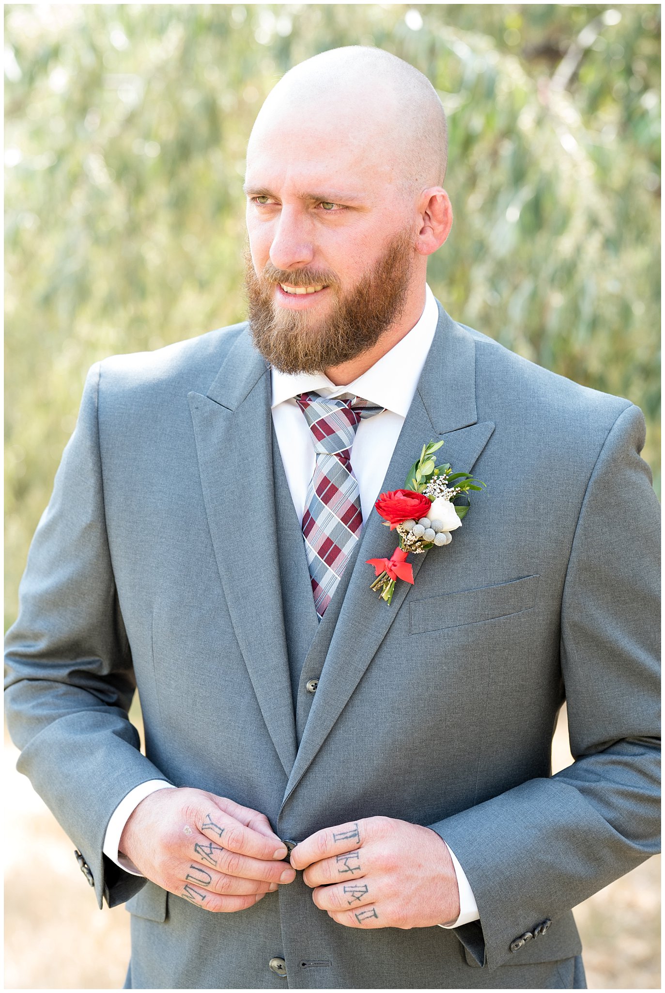 Candid groom buttoning up suit portrait | Davis County Outdoor Wedding | Jessie and Dallin Photography