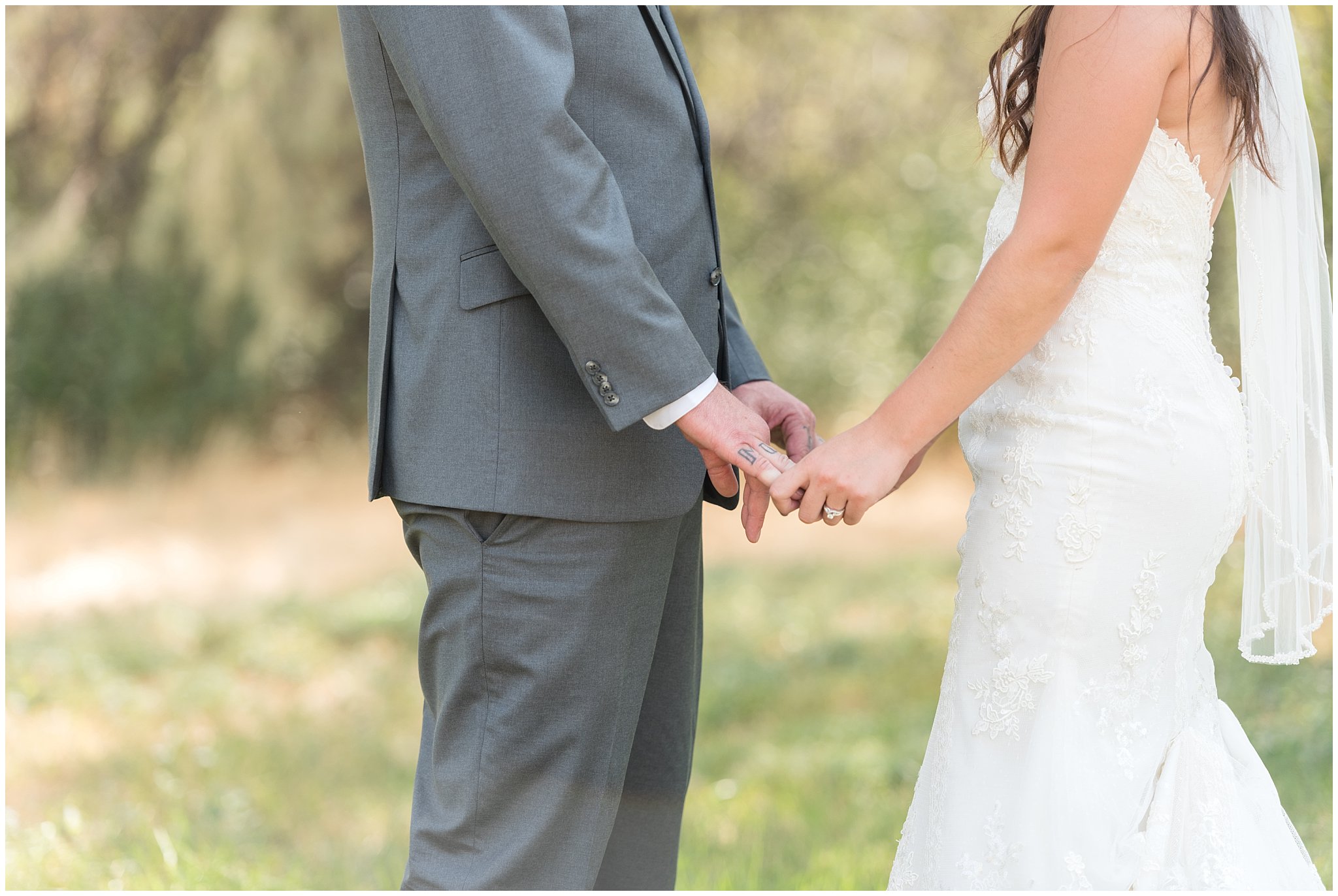 Bride and groom holding hands after their first look | Davis County Outdoor Wedding | Jessie and Dallin Photography