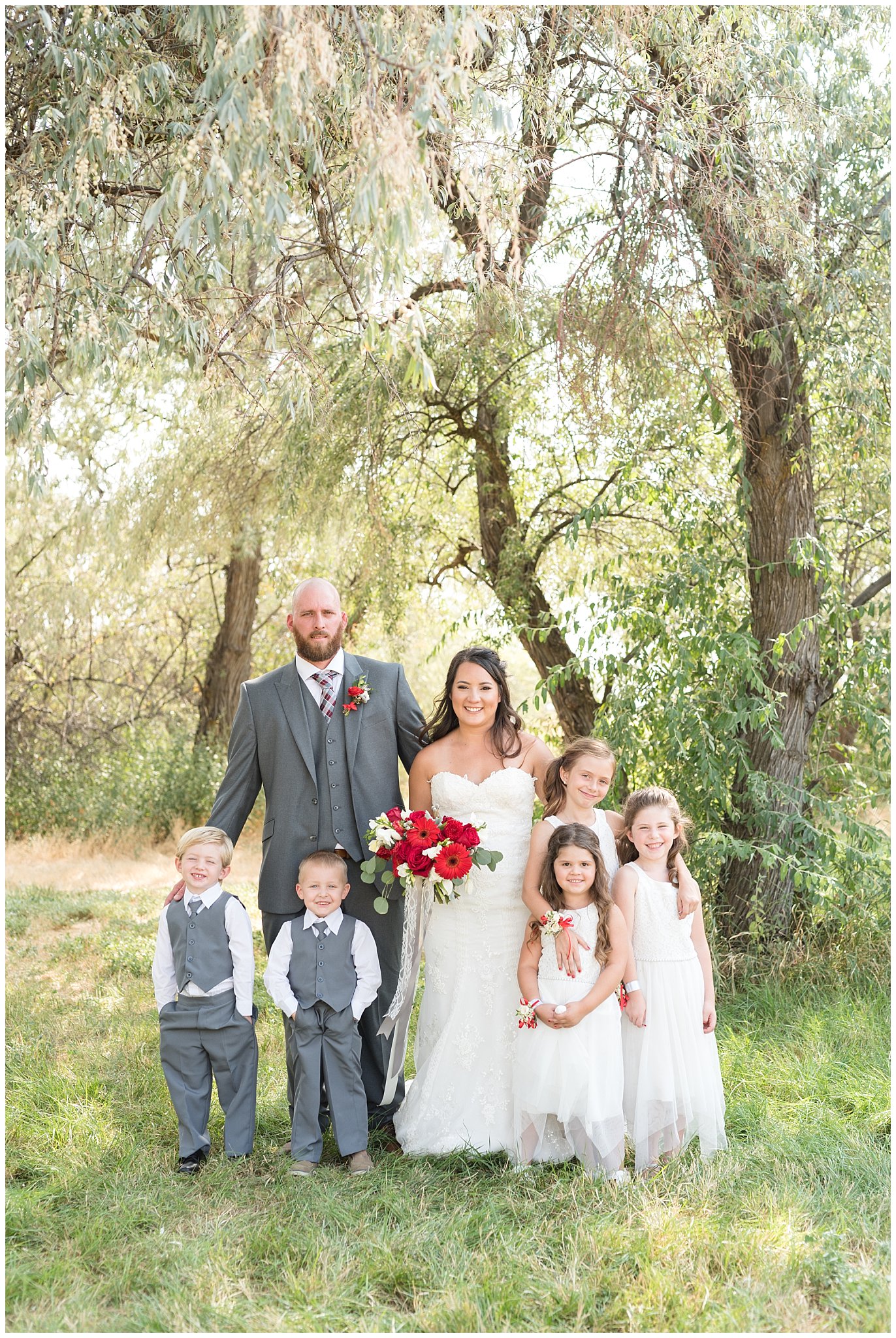 Red and white outdoor wedding | Bride and groom, ring bearers, and flower girls | Davis County Outdoor Wedding | Jessie and Dallin Photography