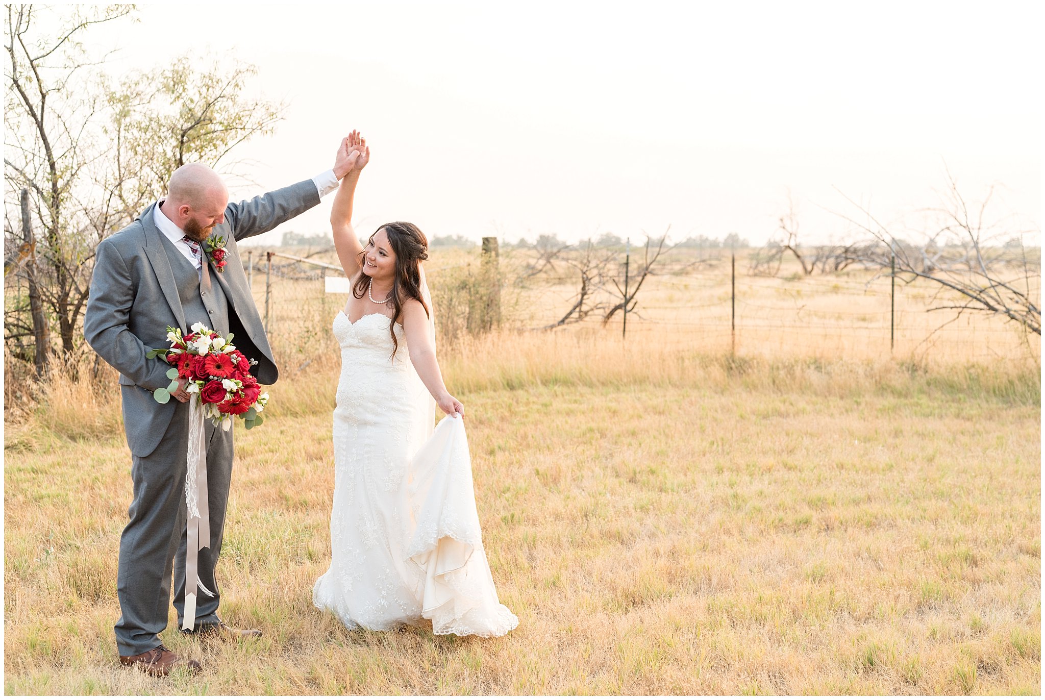 Bride and groom dancing and twirling during sunset portraits | Red and Grey wedding | Davis County Outdoor Wedding | Jessie and Dallin Photography