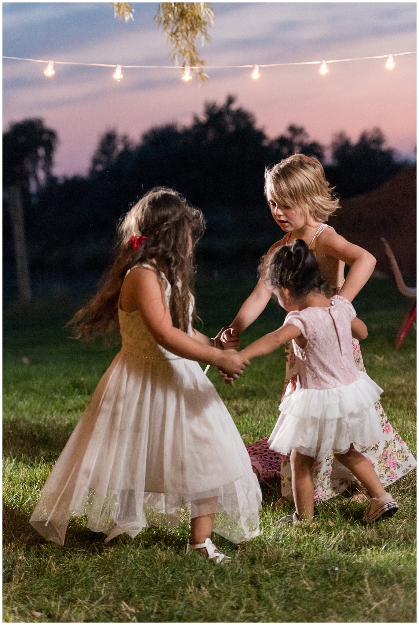 Kids holding hands and party dancing | Red and Grey wedding | Davis County Outdoor Wedding | Jessie and Dallin Photography
