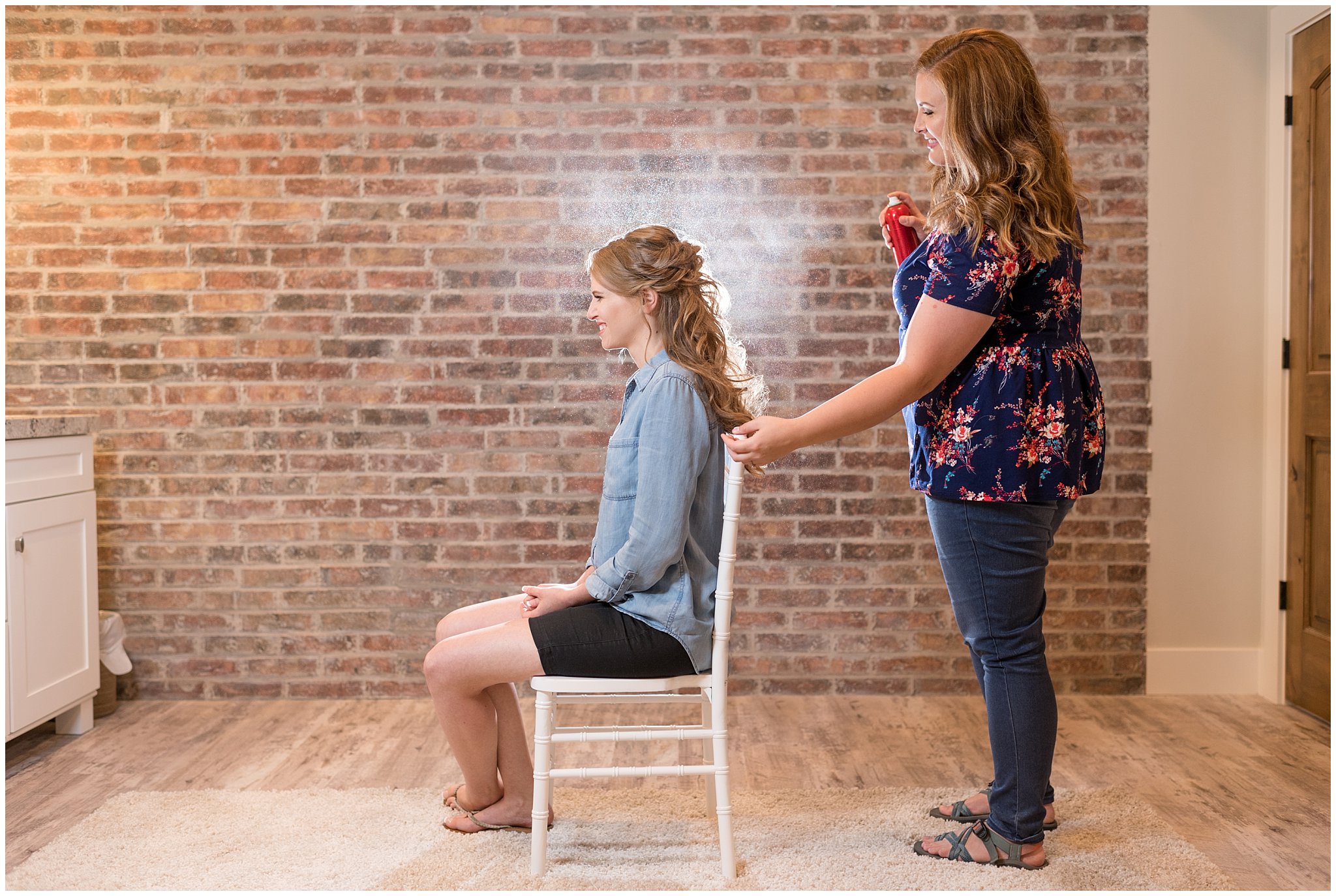 Hailey doing fun hairspray shot at Talia Event Center | Why Hire a professional hair and makeup artist | Jessie and Dallin Photography