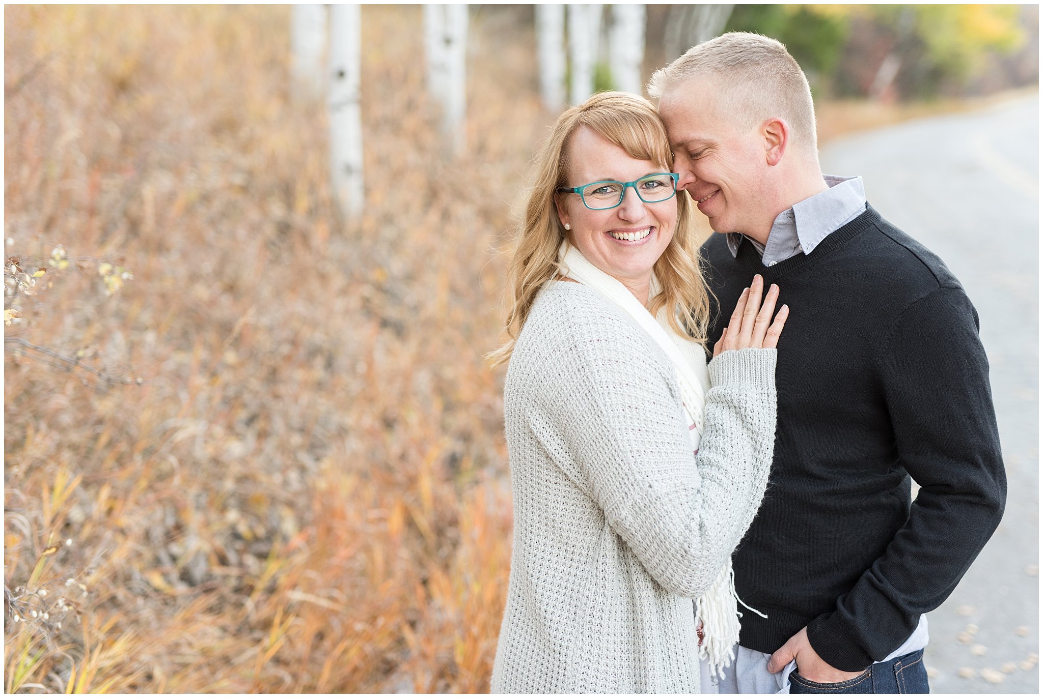 Couple nuzzling in the aspen trees | Fall Family Pictures in the Mountains | Snowbasin, Utah | Jessie and Dallin Photography