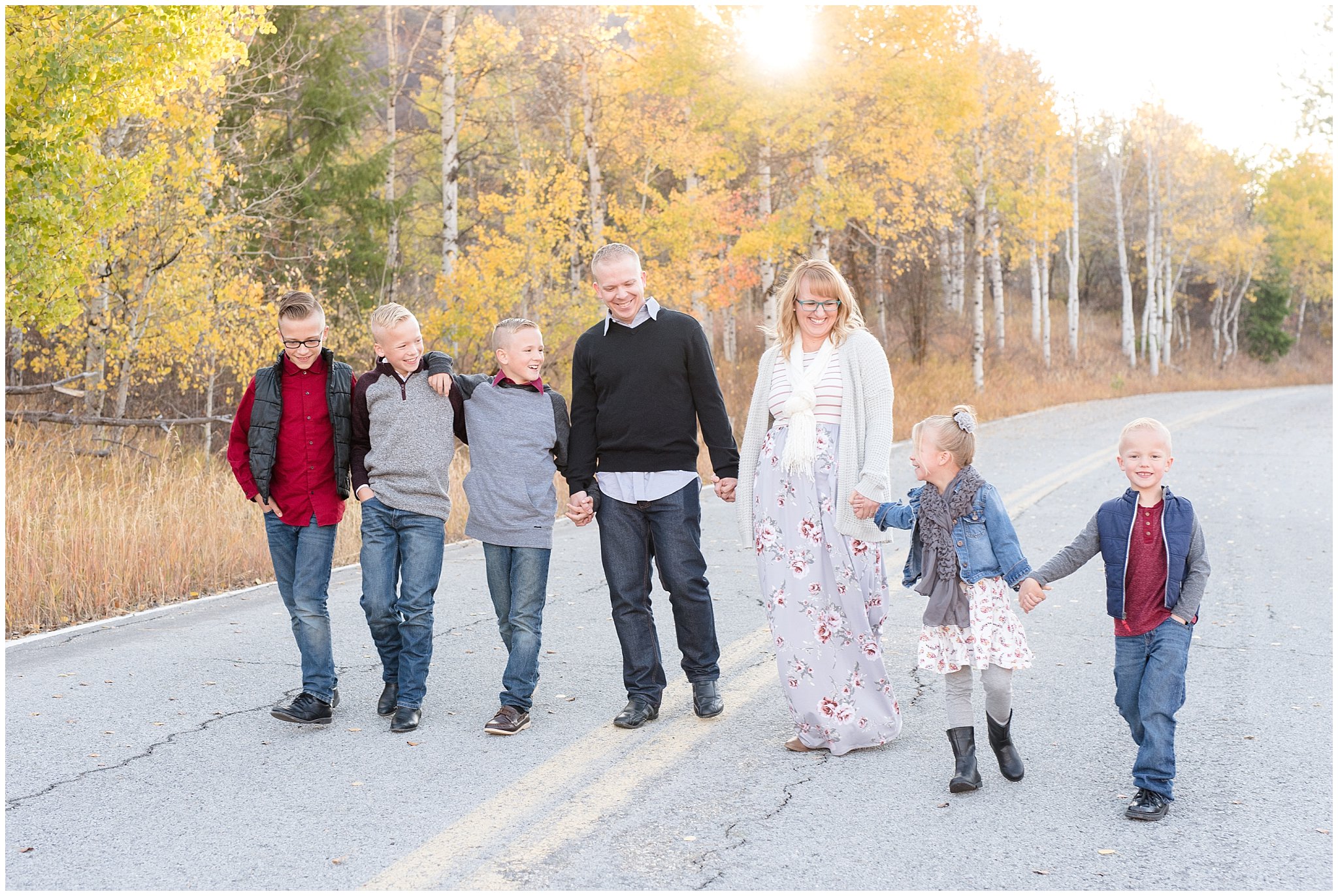 Family with five kids walking down the road | Fall Family Pictures in the Mountains | Snowbasin, Utah | Jessie and Dallin Photography