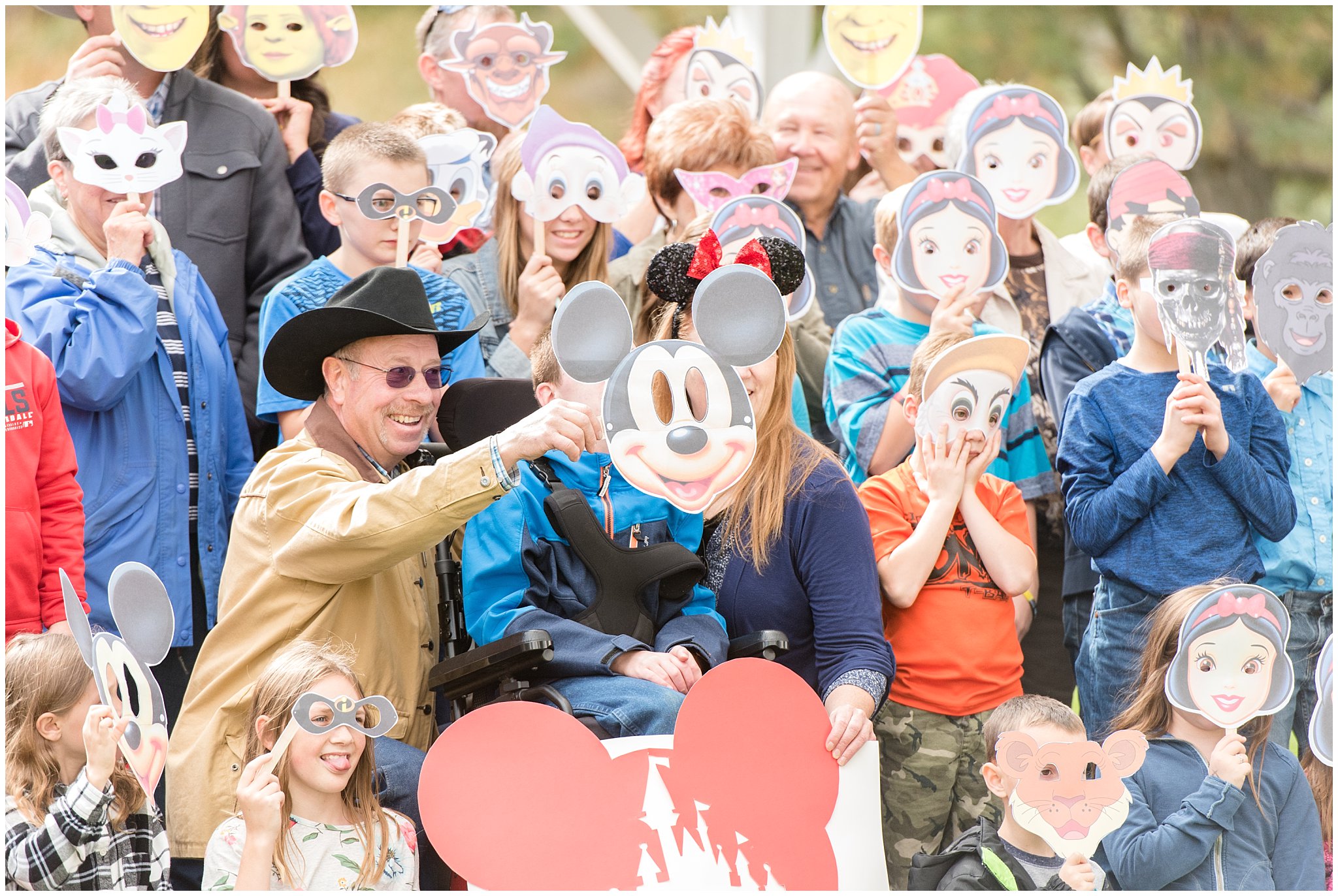 Candid picture of group with masks | Tremonton Family Pictures and Make a Wish Event | Jessie and Dallin Photography