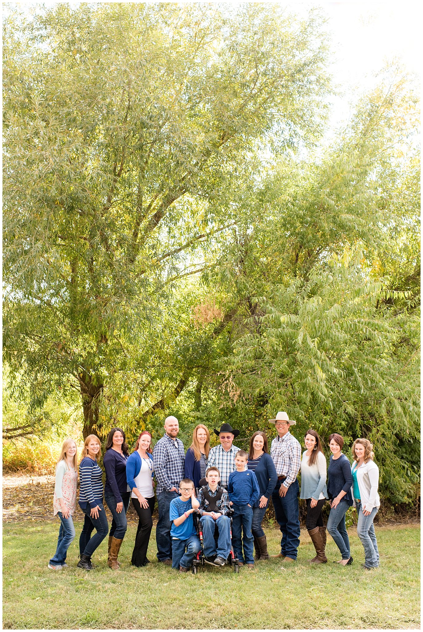 Large family of 12 kids smiling at the camera | Tremonton Family Pictures and Make a Wish Event | Jessie and Dallin Photography