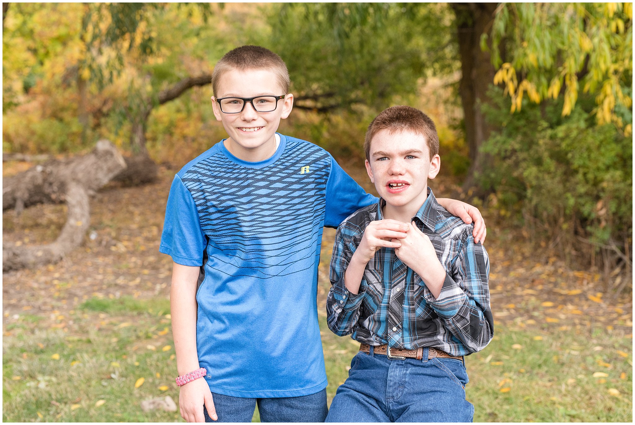 Twin brothers in wheelchair and one standing for pictures | Tremonton Family Pictures and Make a Wish Event | Jessie and Dallin Photography