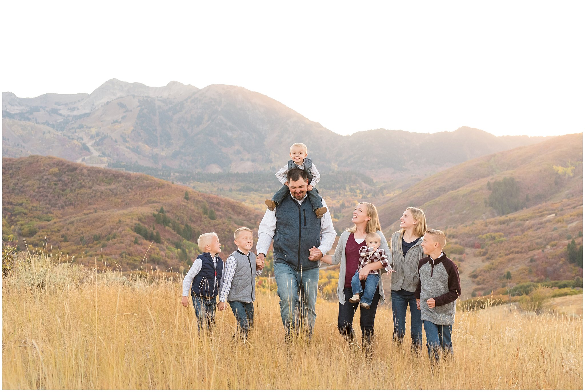 Family of 8 walking in the fall leaves | Fall family photo session at Snowbasin | Snowbasin Resort | Jessie and Dallin Photography