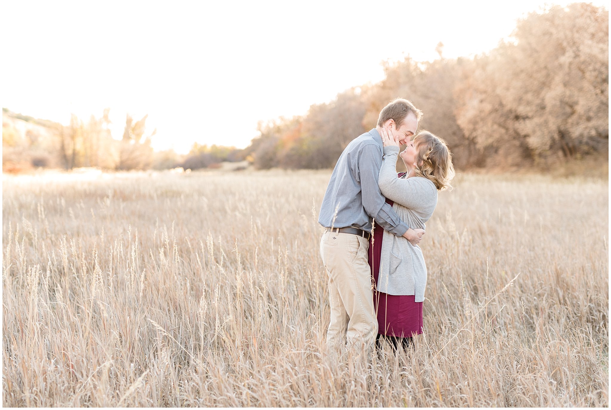 Couple kissing in a field | Davis County Fall Engagement | Utah Wedding Photographers | Jessie and Dallin