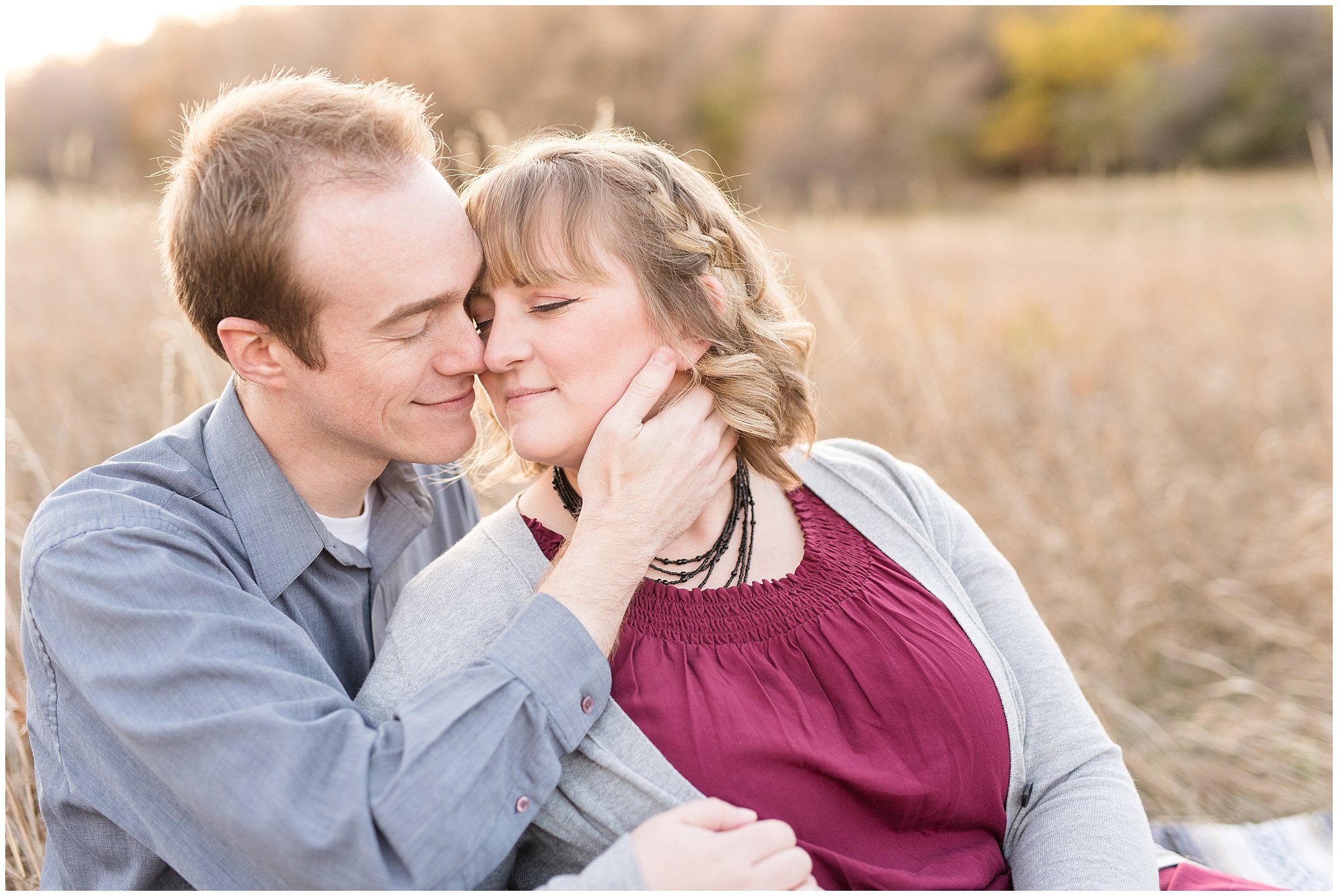 Couple sitting in the field grass | Davis County Fall Engagement | Utah Wedding Photographers | Jessie and Dallin