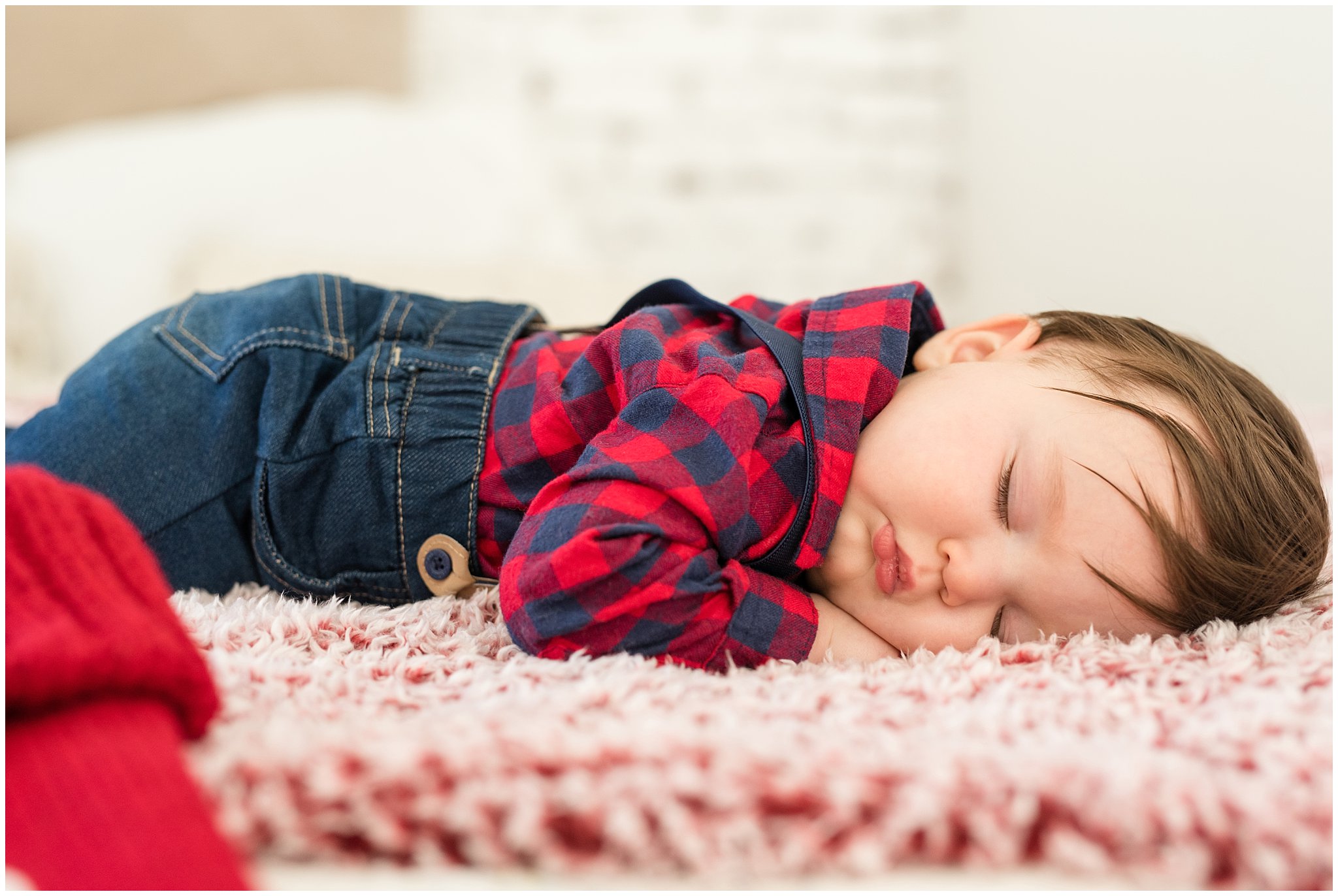 Baby boy asleep on the bed | Family Christmas session at the 5th floor | Utah Photographers | Jessie and Dallin Photography