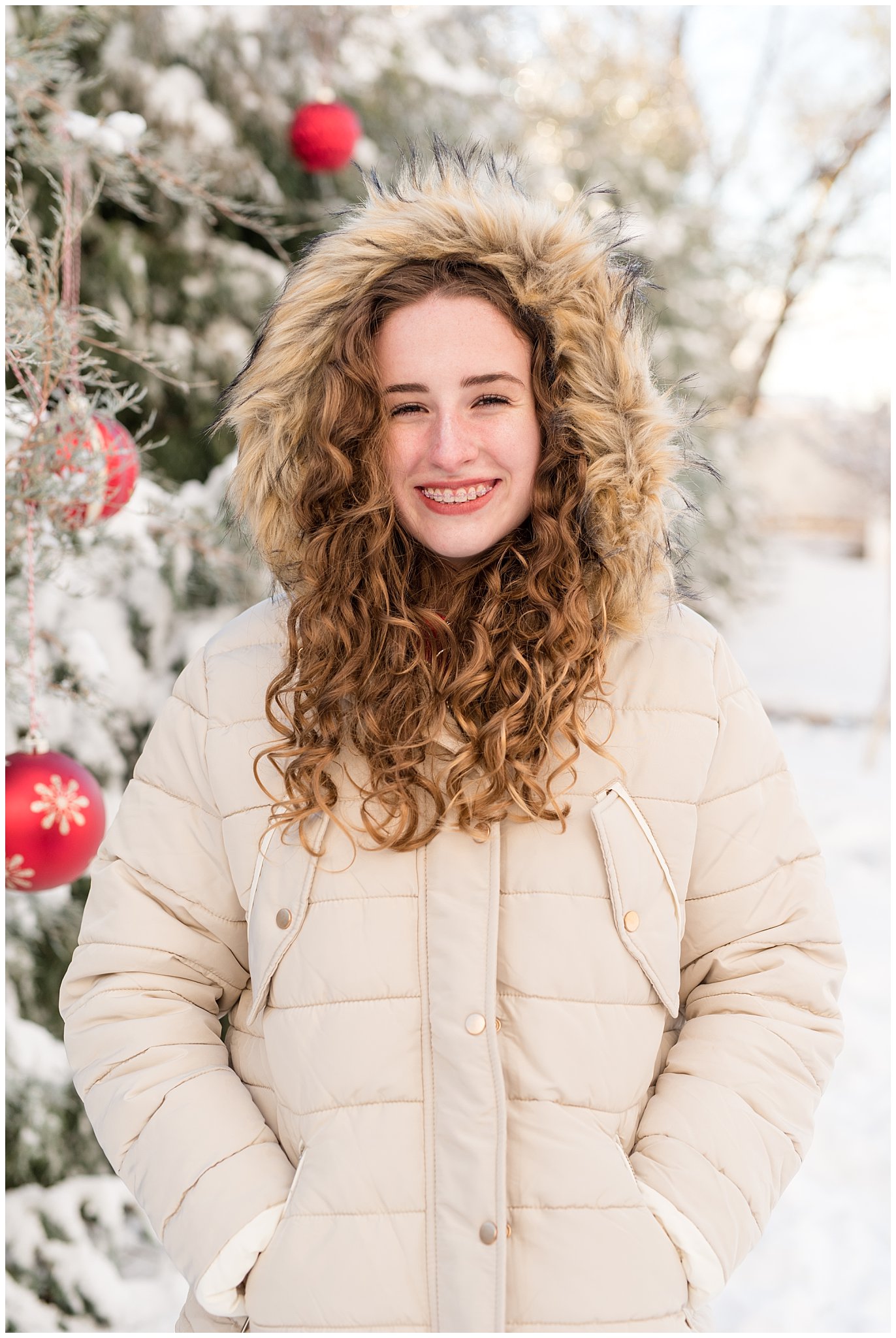 Teenage girl in fur hooded snow coat | Utah Family Christmas Photoshoot | Oak Hills Reception and Event | Jessie and Dallin Photography