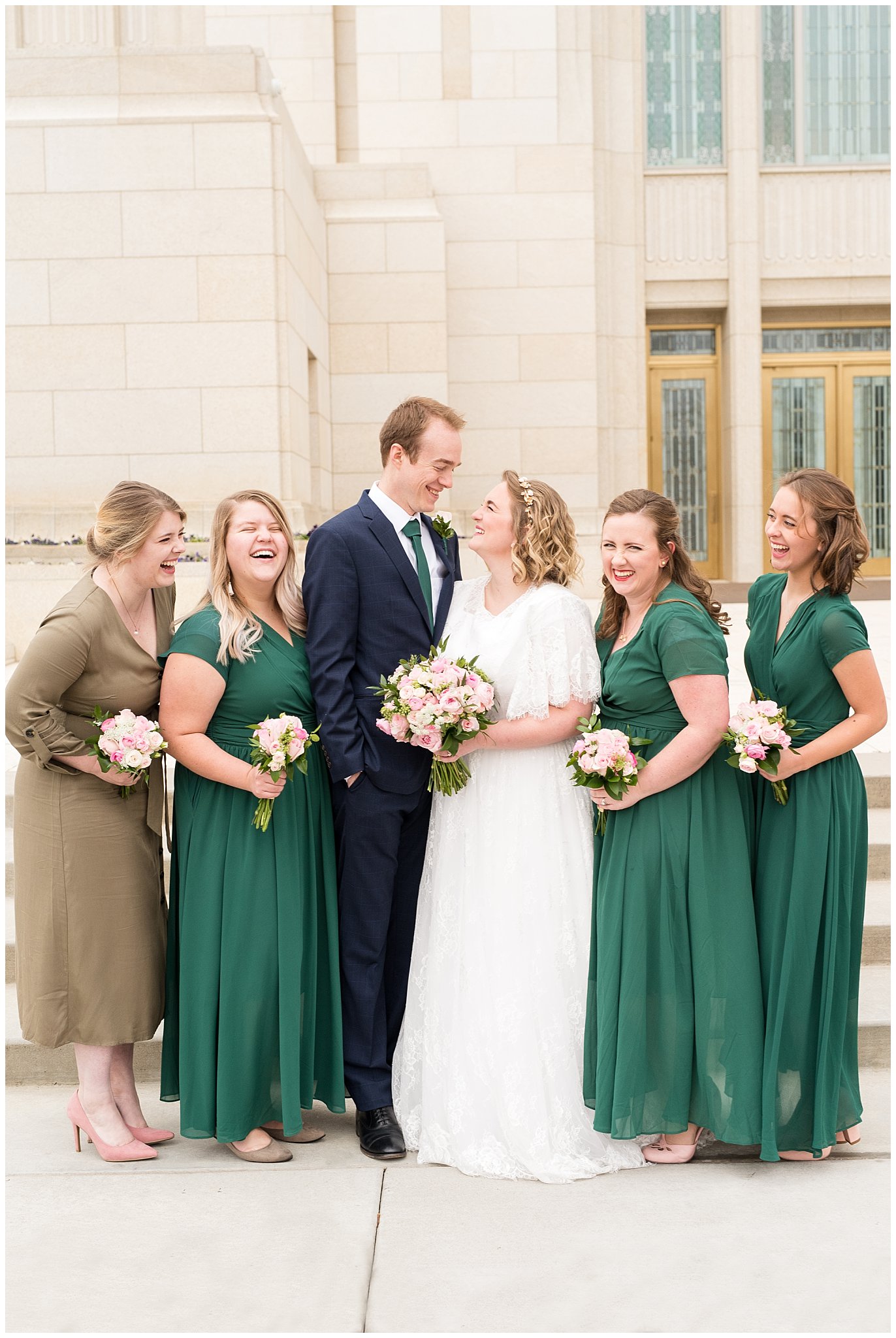 Bride and groom laughing with bridesmaids | Ogden Temple Winter Wedding | Emerald Green and Pink Wedding | Jessie and Dallin Photography