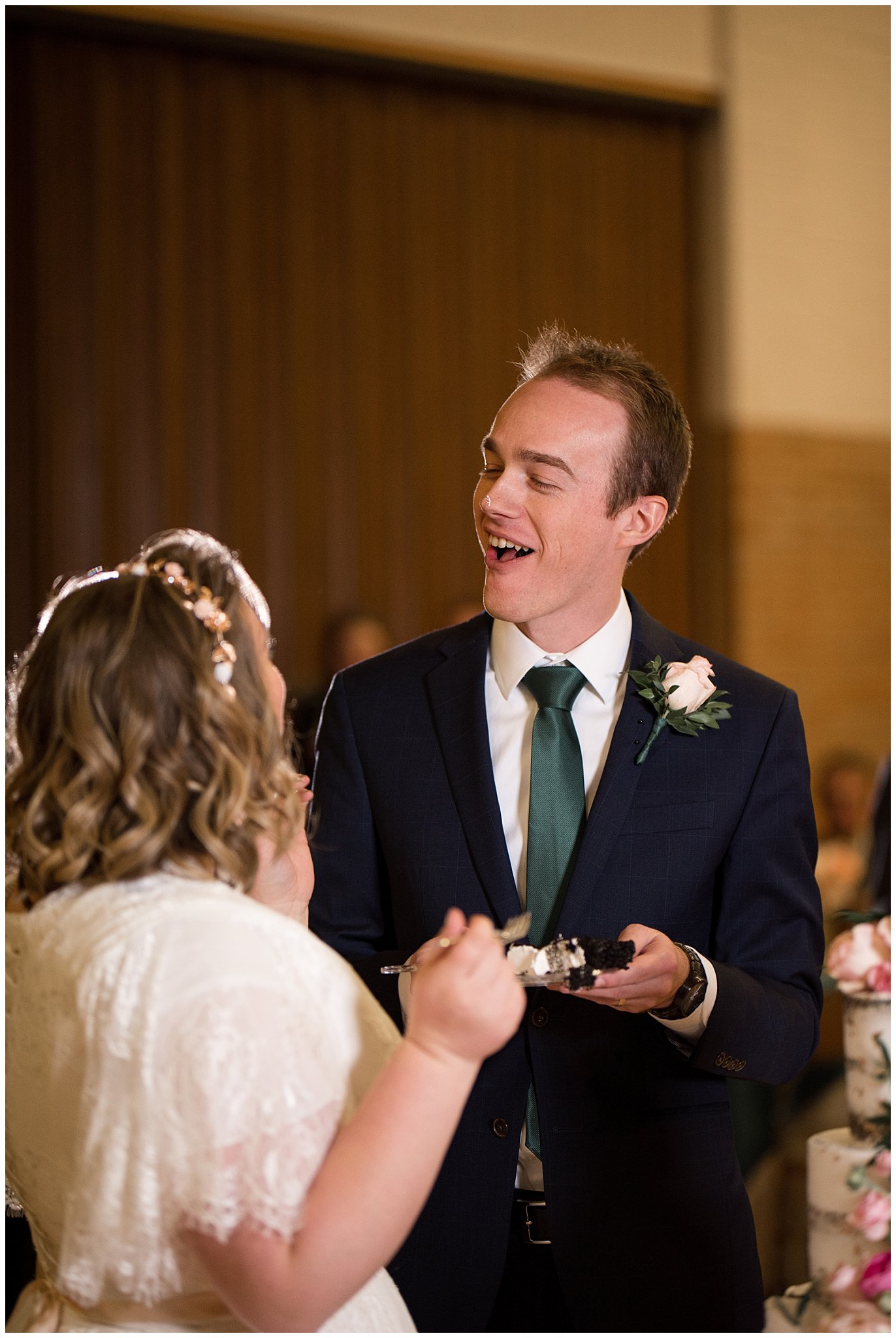 Bride puts cake on groom's nose | Ogden Temple Winter Wedding | Emerald Green and Pink Wedding | Jessie and Dallin Photography