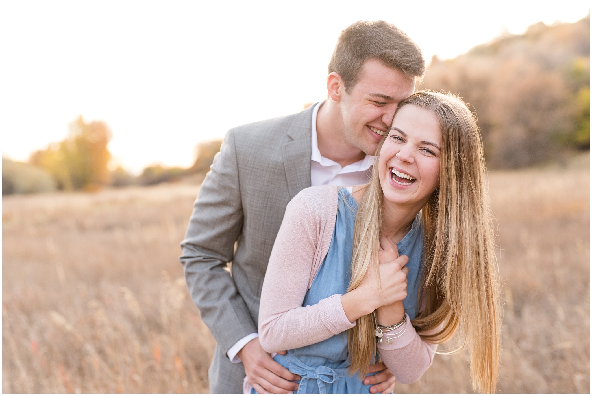 Utah Fall engagement | Couple laughing in the fall grass | Jessie and Dallin Photography