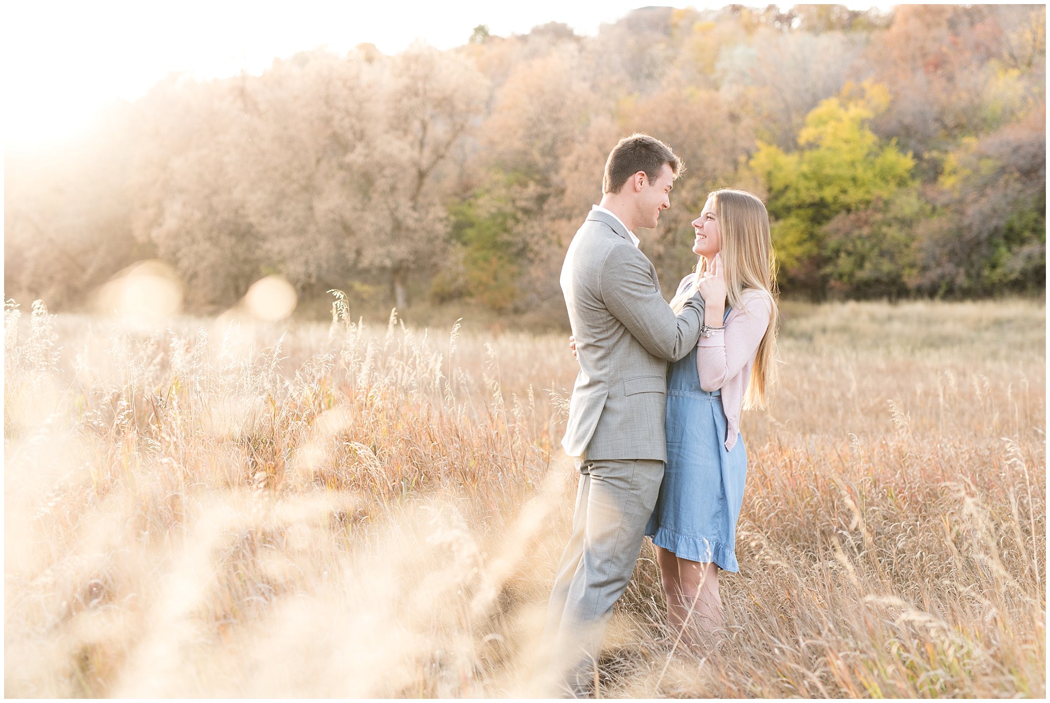 Utah Fall Engagement | Couple embracing in a field | Jessie and Dallin Photography