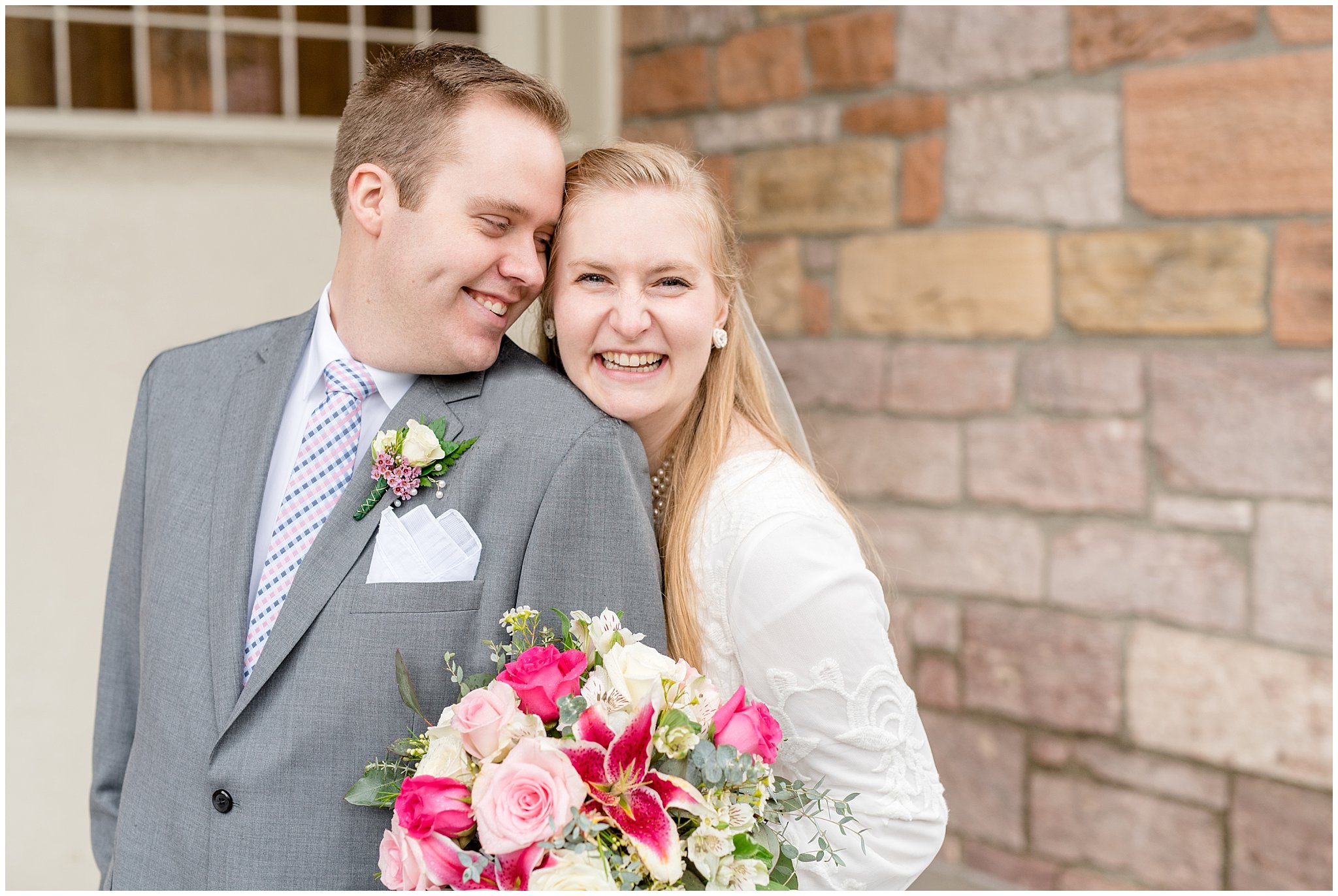 Salt Lake Temple wedding | Bride and groom with pink flowers | Jessie and Dallin Photography