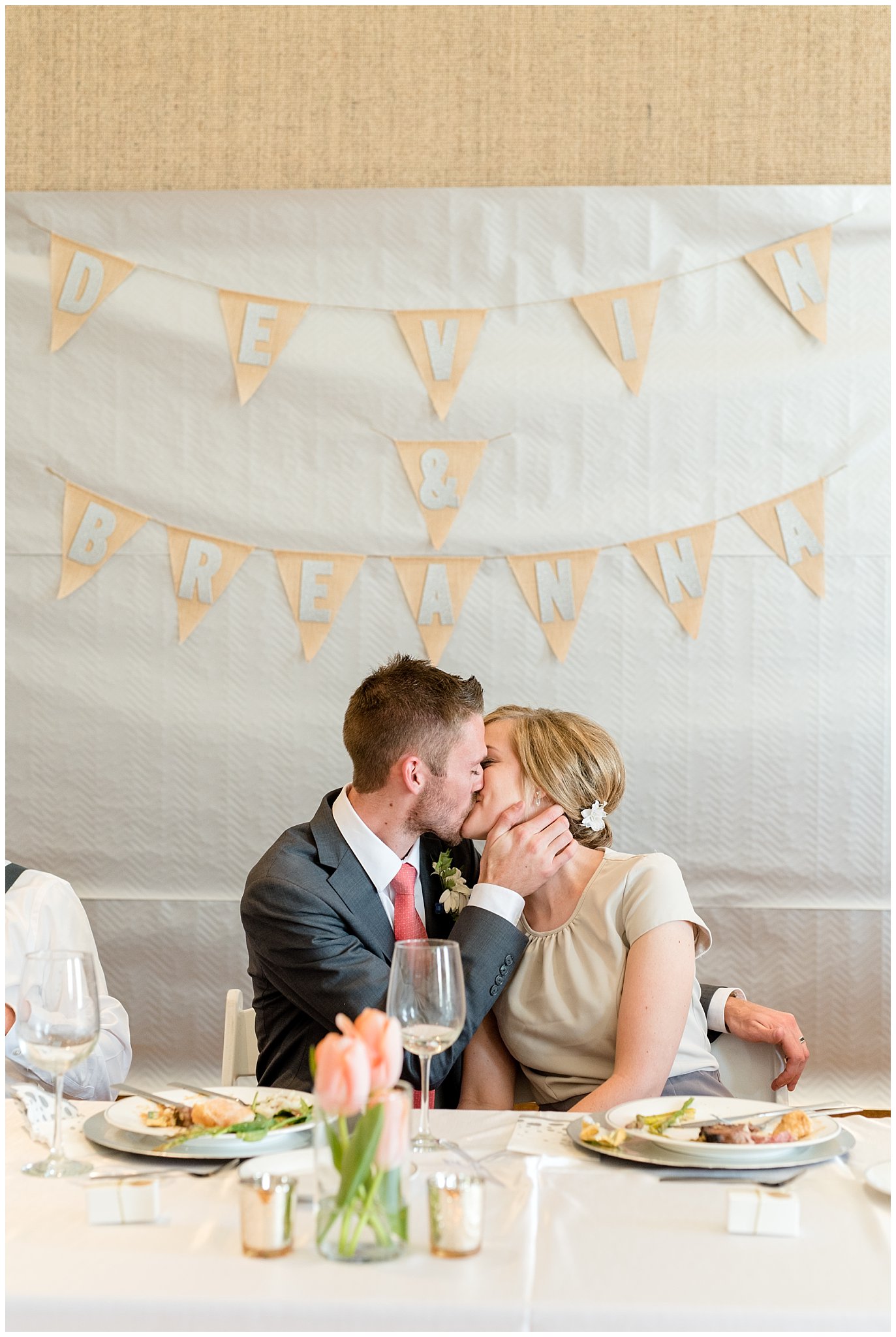 Salt Lake City Wedding | Bride and groom kiss at luncheon | Jessie and Dallin Photography