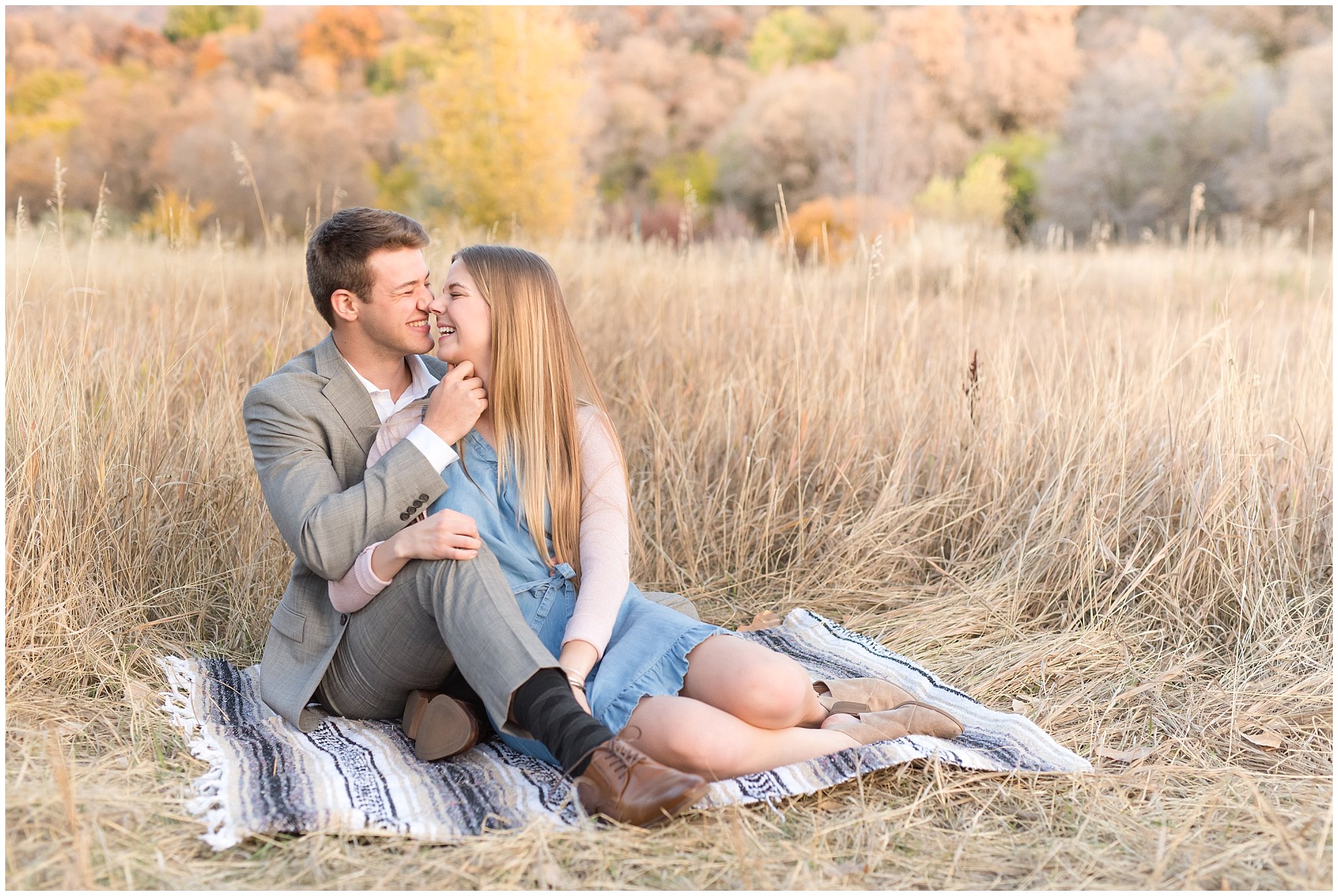 Utah Fall Engagement | Couple sitting and laughing | Jessie and Dallin Photography