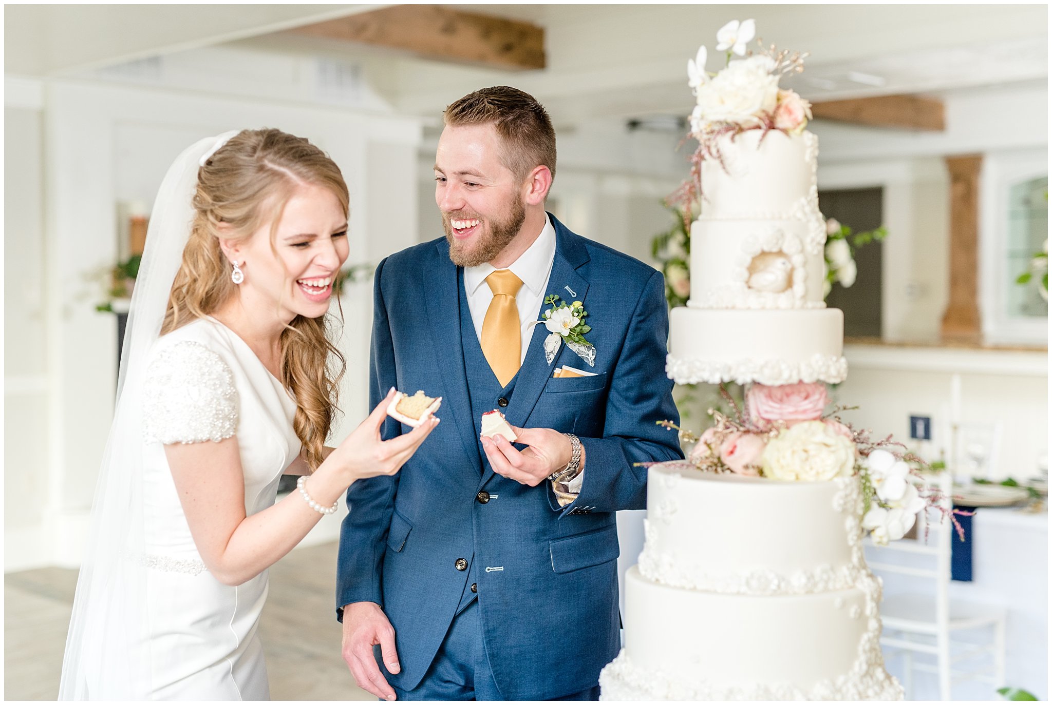 Talia Event Center wedding | Bride and groom eating cake and laughing | Jessie and Dallin Photography