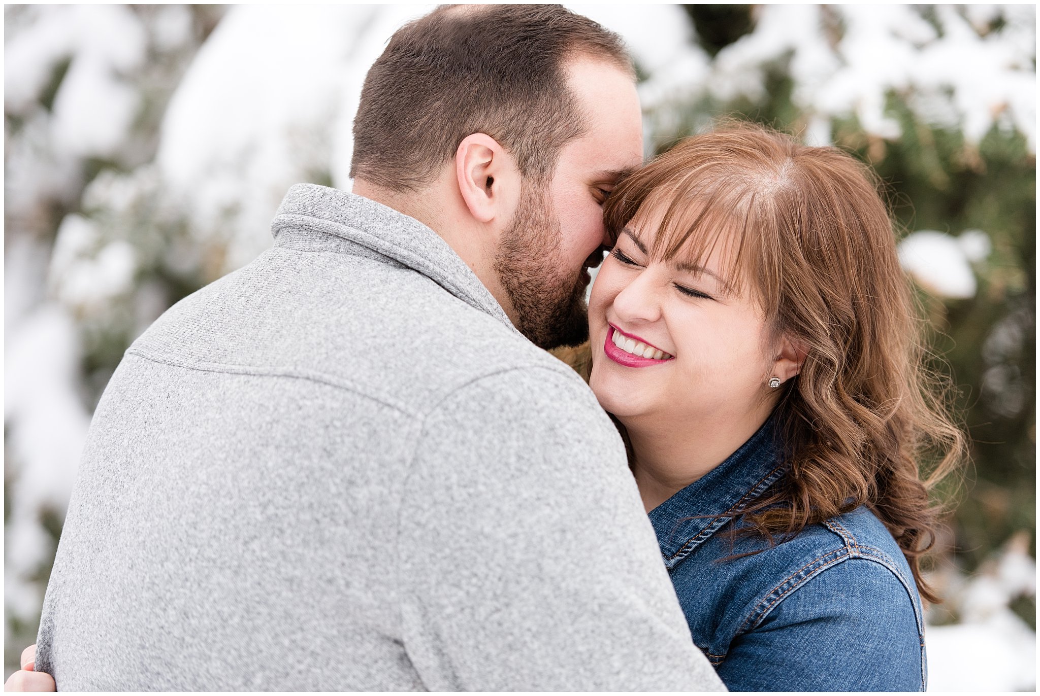 Couple laughing and hugging in the forest |  Winter Engagement at Mueller Park and the Utah State Capitol | Jessie and Dallin Photography