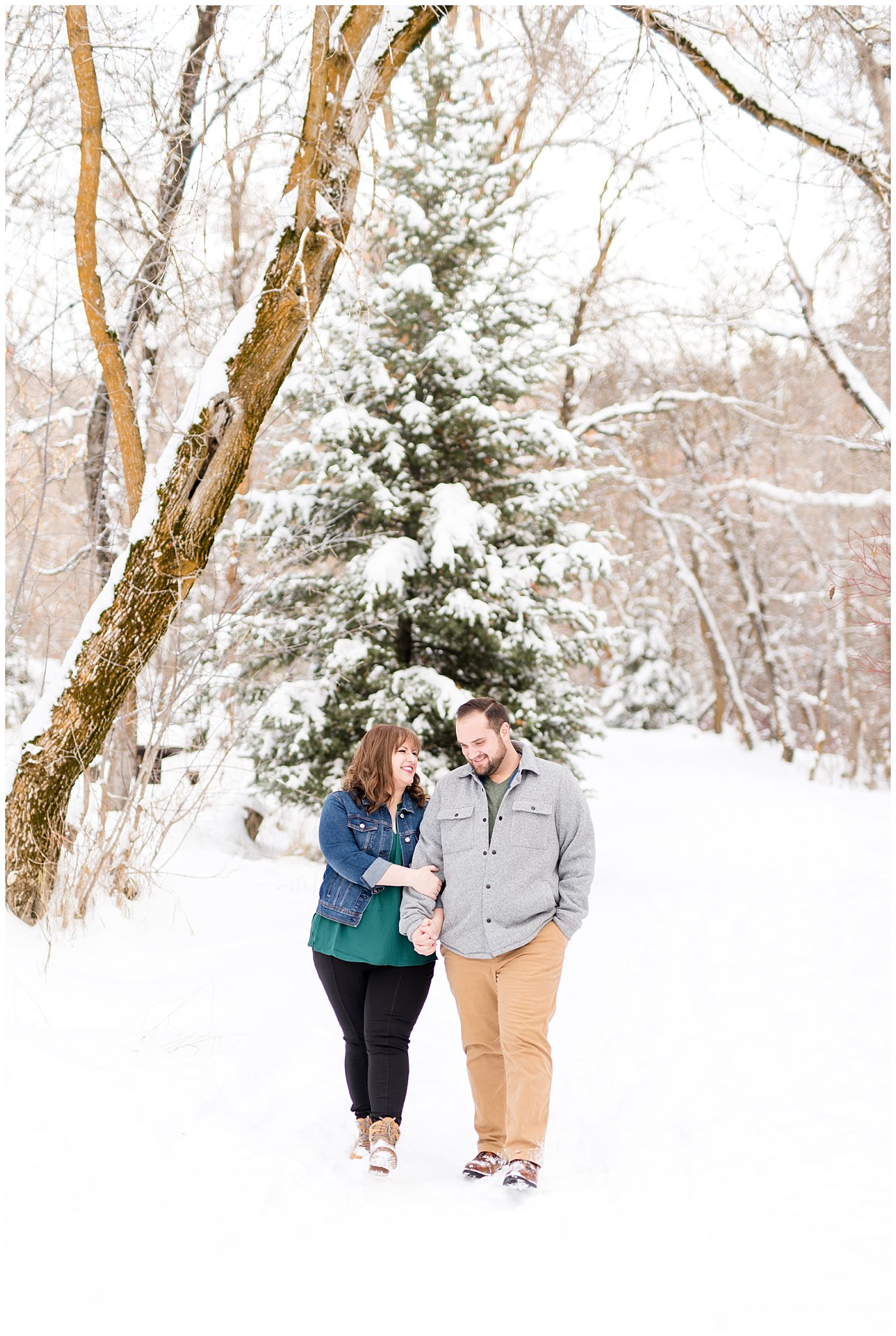 Couple walking through the forest in the winter |  Winter Engagement at Mueller Park and the Utah State Capitol | Jessie and Dallin Photography