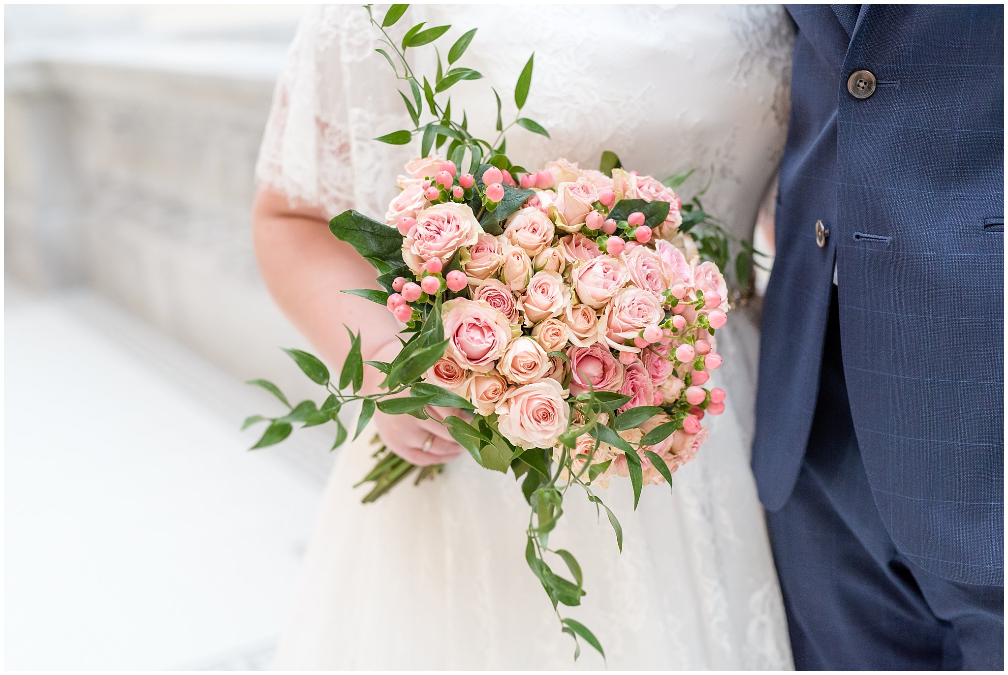 Detail shot of bride holding bouquet of pink roses | Winter Formals at the Utah State Capitol | Utah Wedding Photography