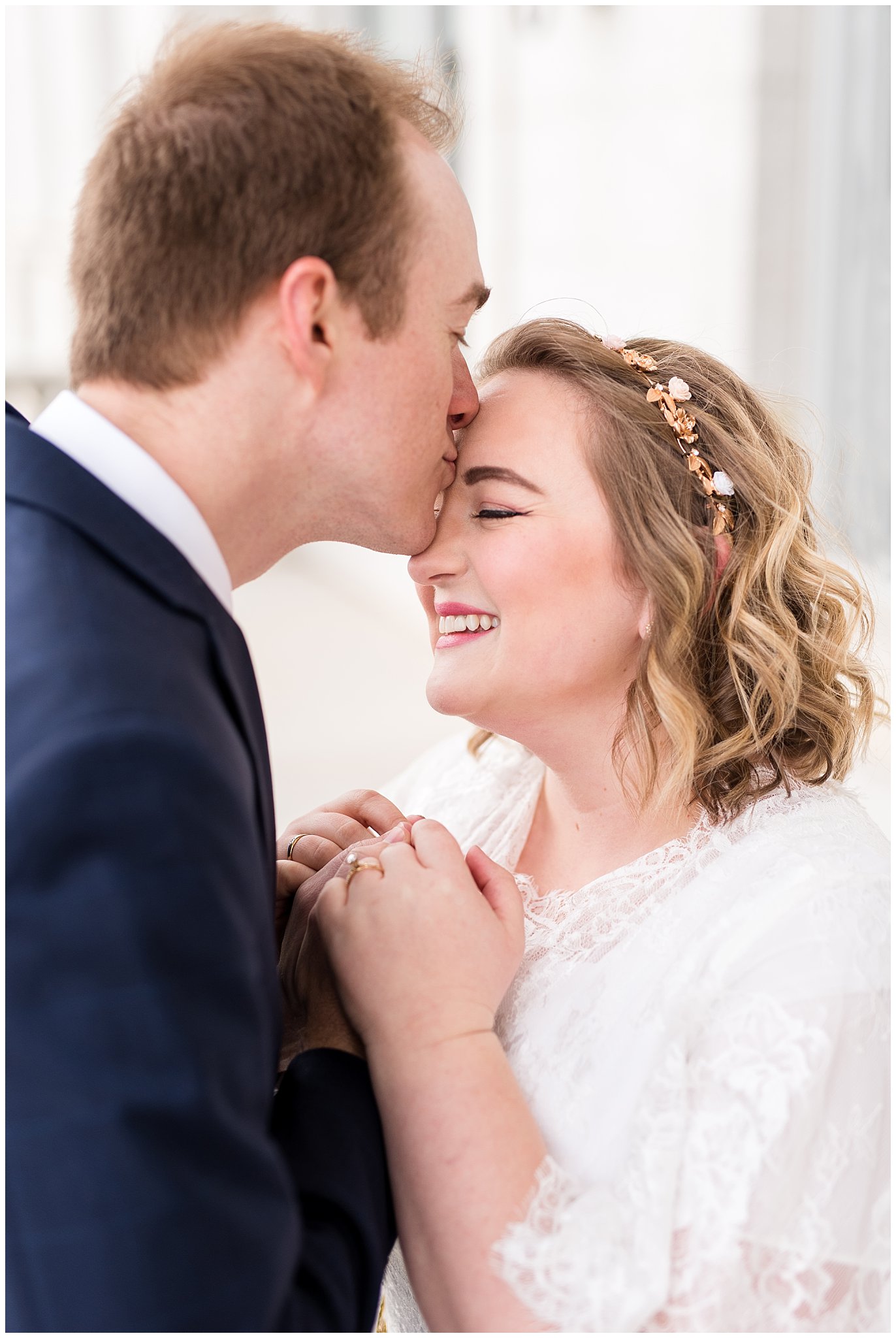 Groom kisses bride on forehead | Winter Formals at the Utah State Capitol | Utah Wedding Photography