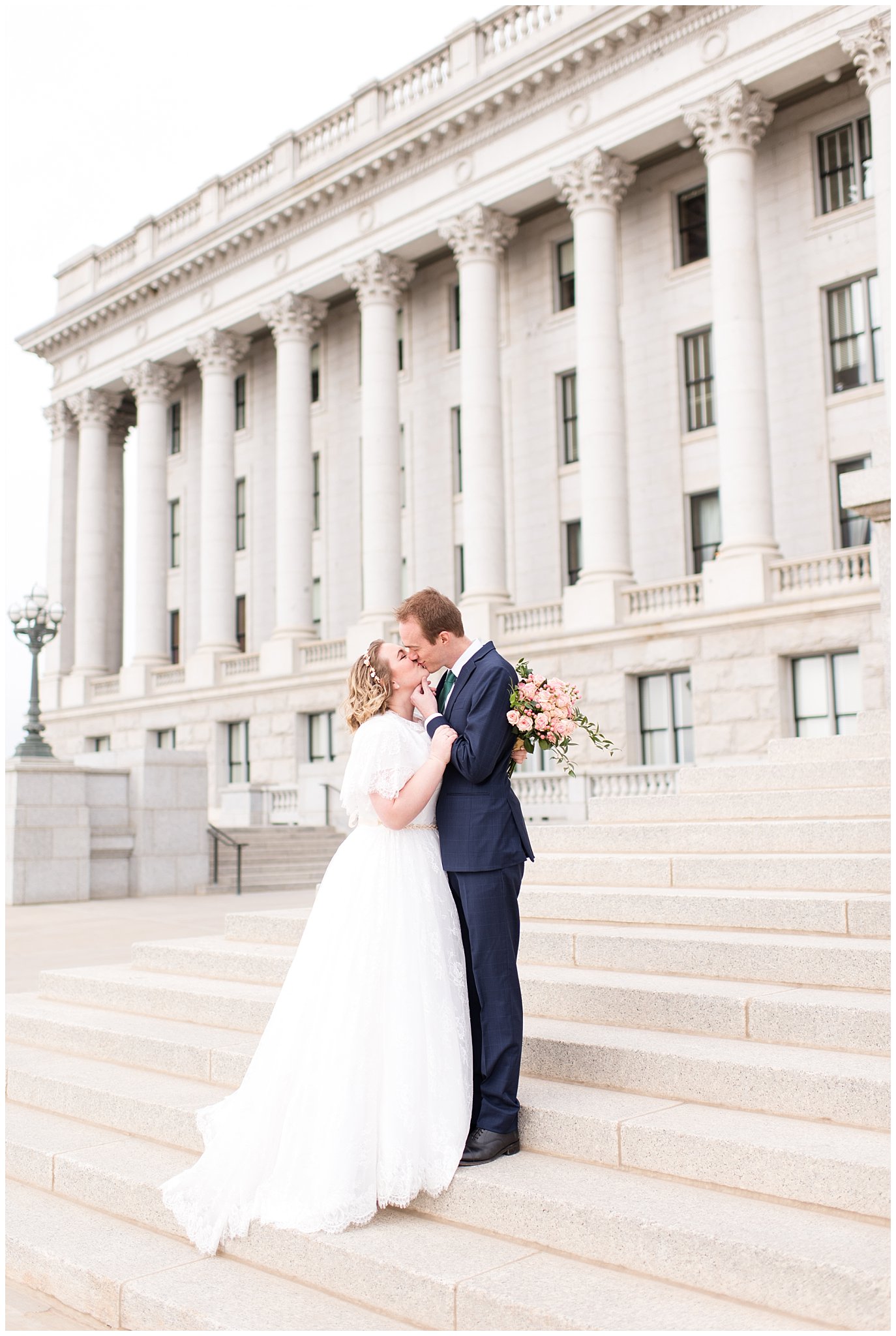 Bride and groom kiss on steps of capitol building | Winter Formals at the Utah State Capitol | Utah Wedding Photography