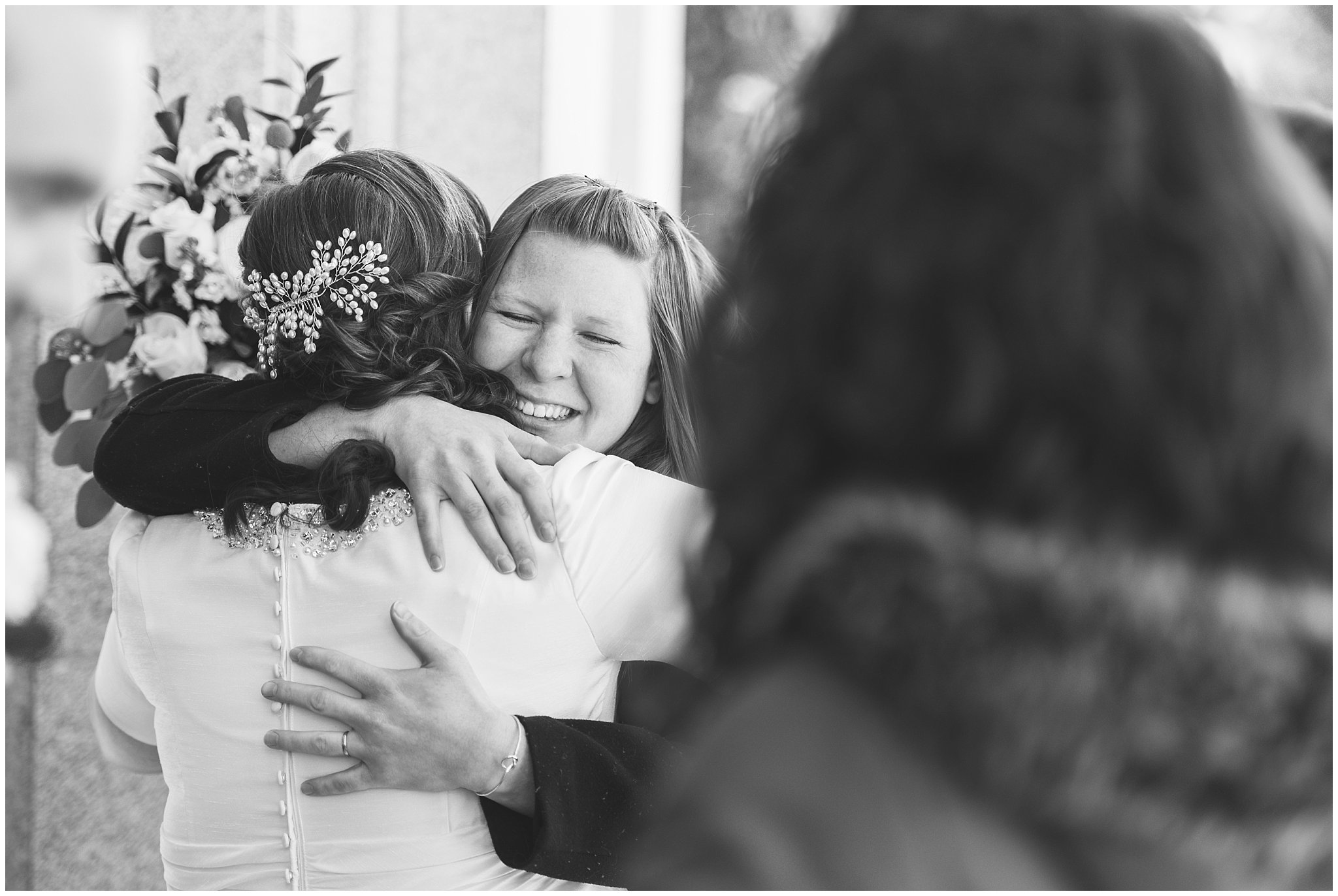 Friends greeting couple during exit | Ogden Temple Wedding | Jessie and Dallin Photography