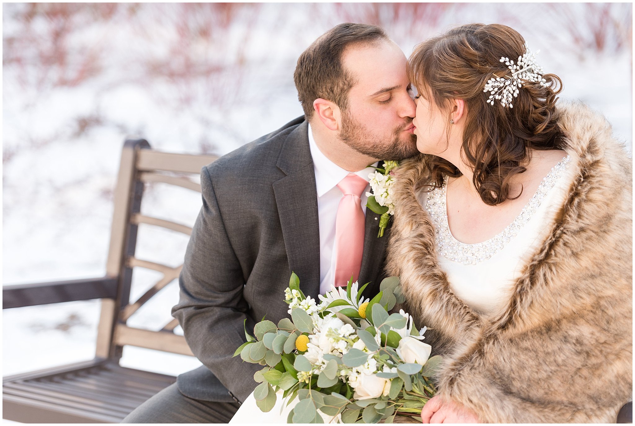 Bride and groom kissing on a bench | Ogden Temple Wedding | Jessie and Dallin Photography