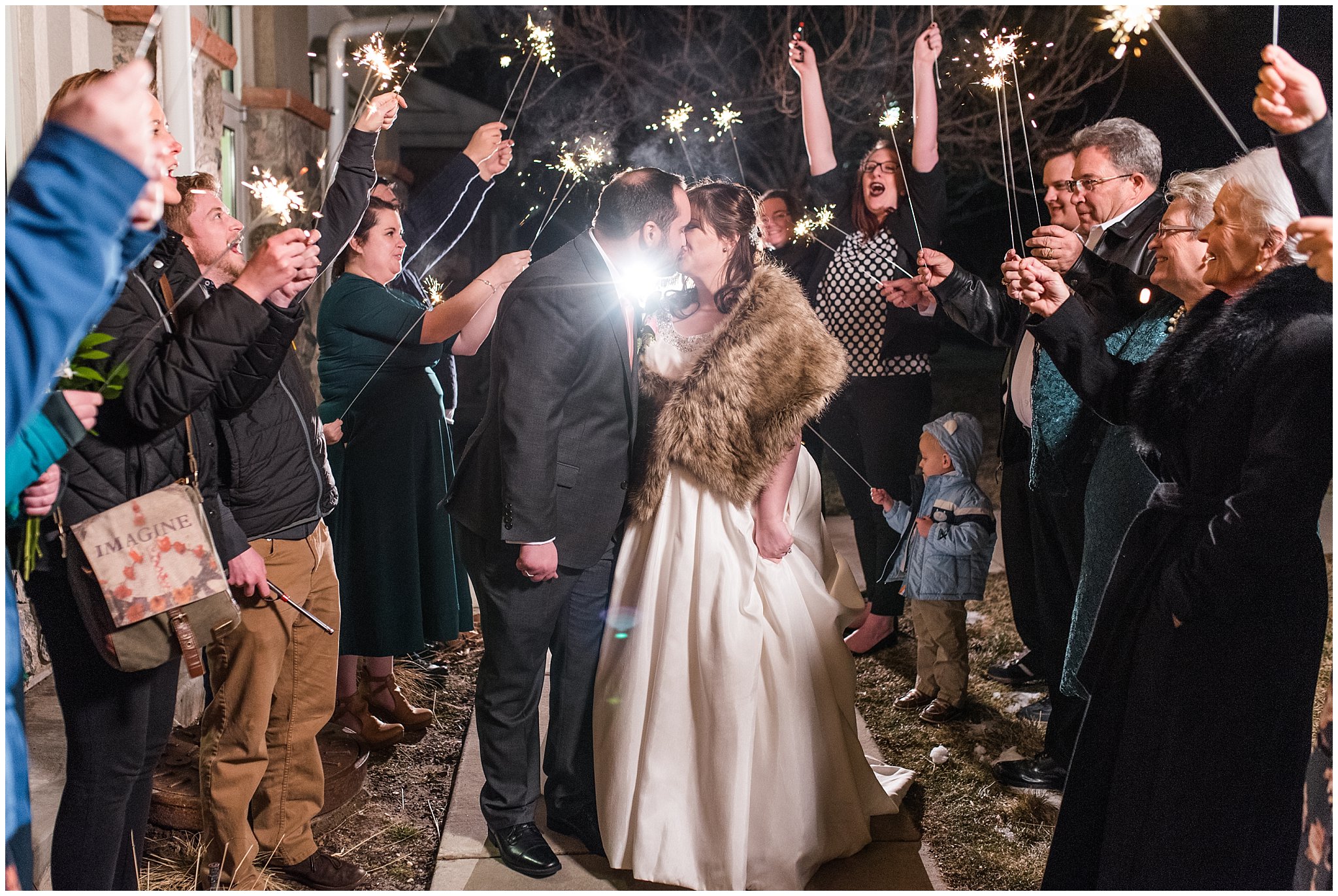 Kiss during sparkler exit | Ogden Temple Wedding | Jessie and Dallin Photography